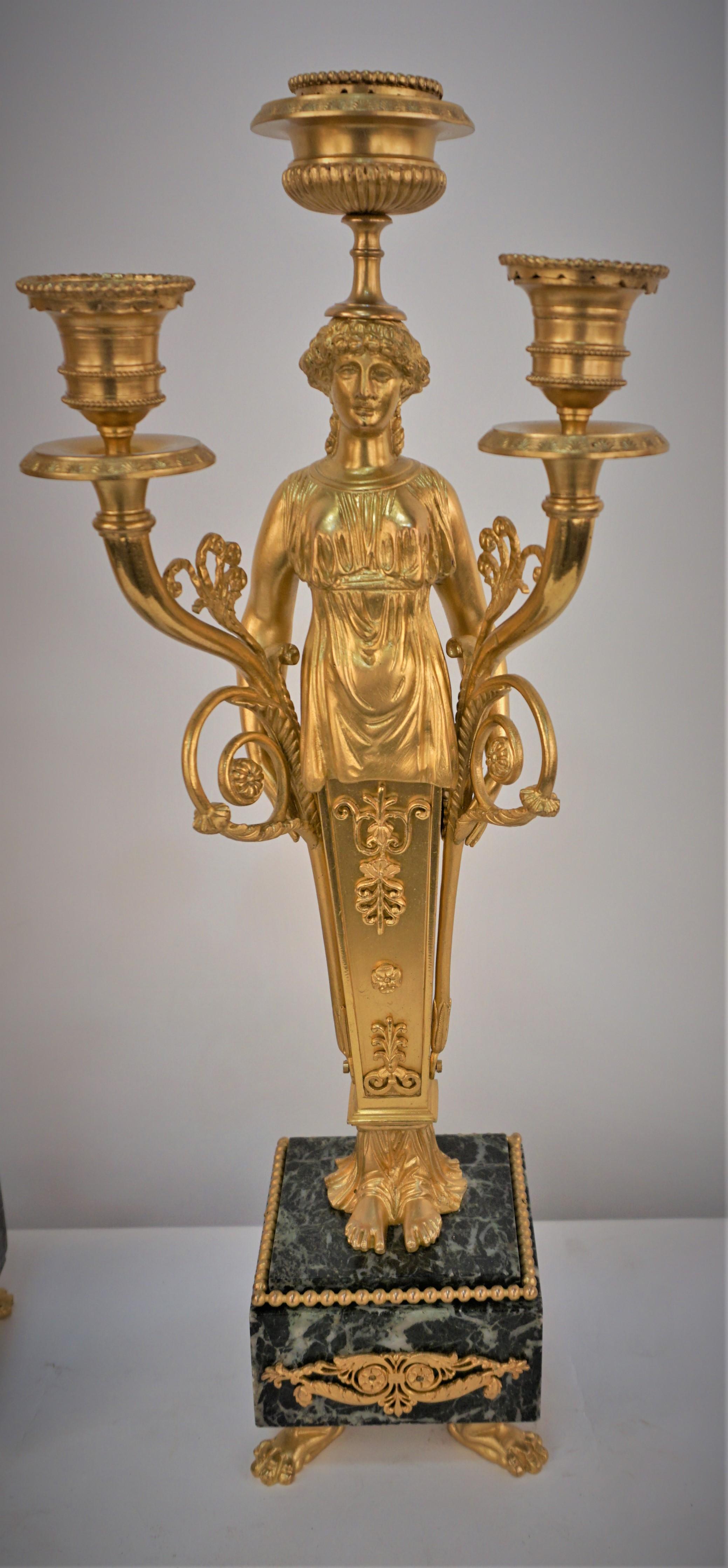 Pair of late 19th century empire Dore bronze woman column candelabras with marble base.