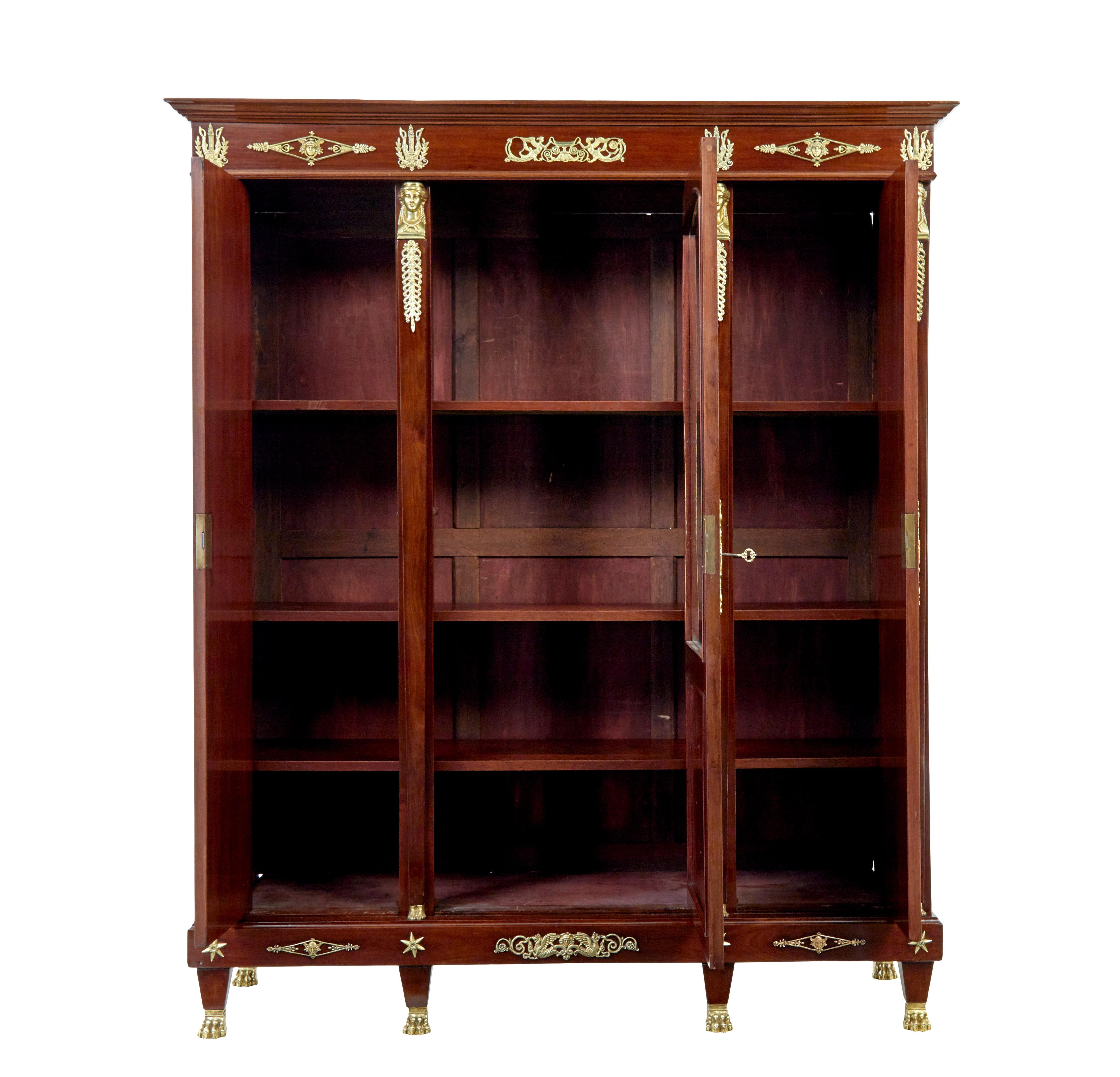 Empire Late 19th Century French empire mahogany and ormolu cabinet For Sale