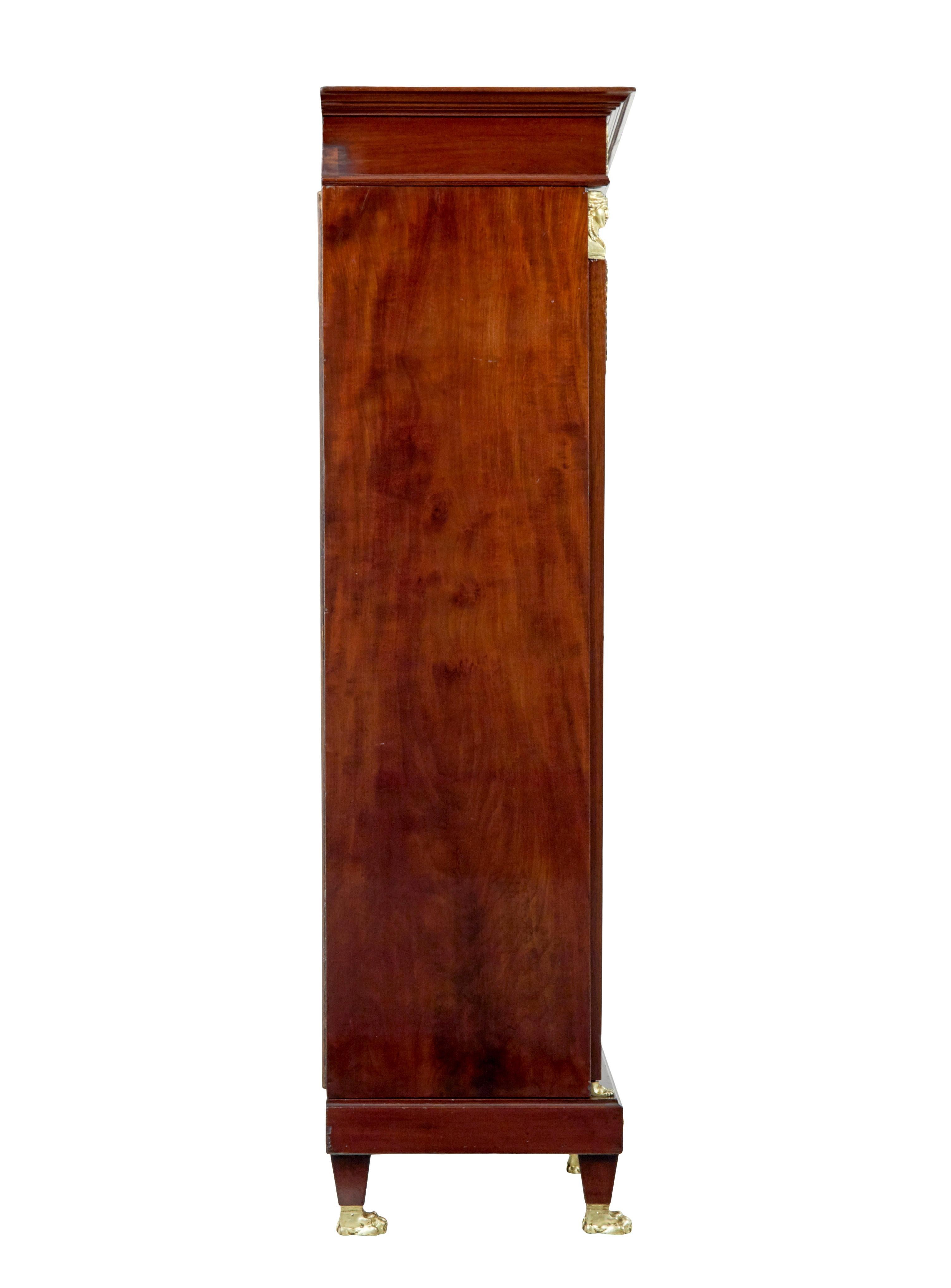 Hand-Carved Late 19th Century French empire mahogany and ormolu cabinet For Sale