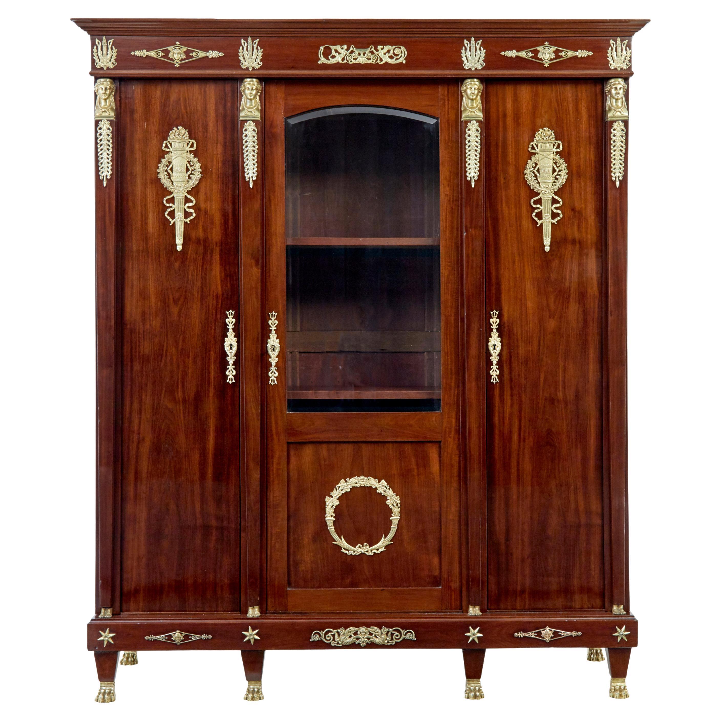 Late 19th century French empire mahogany and ormolu cabinet