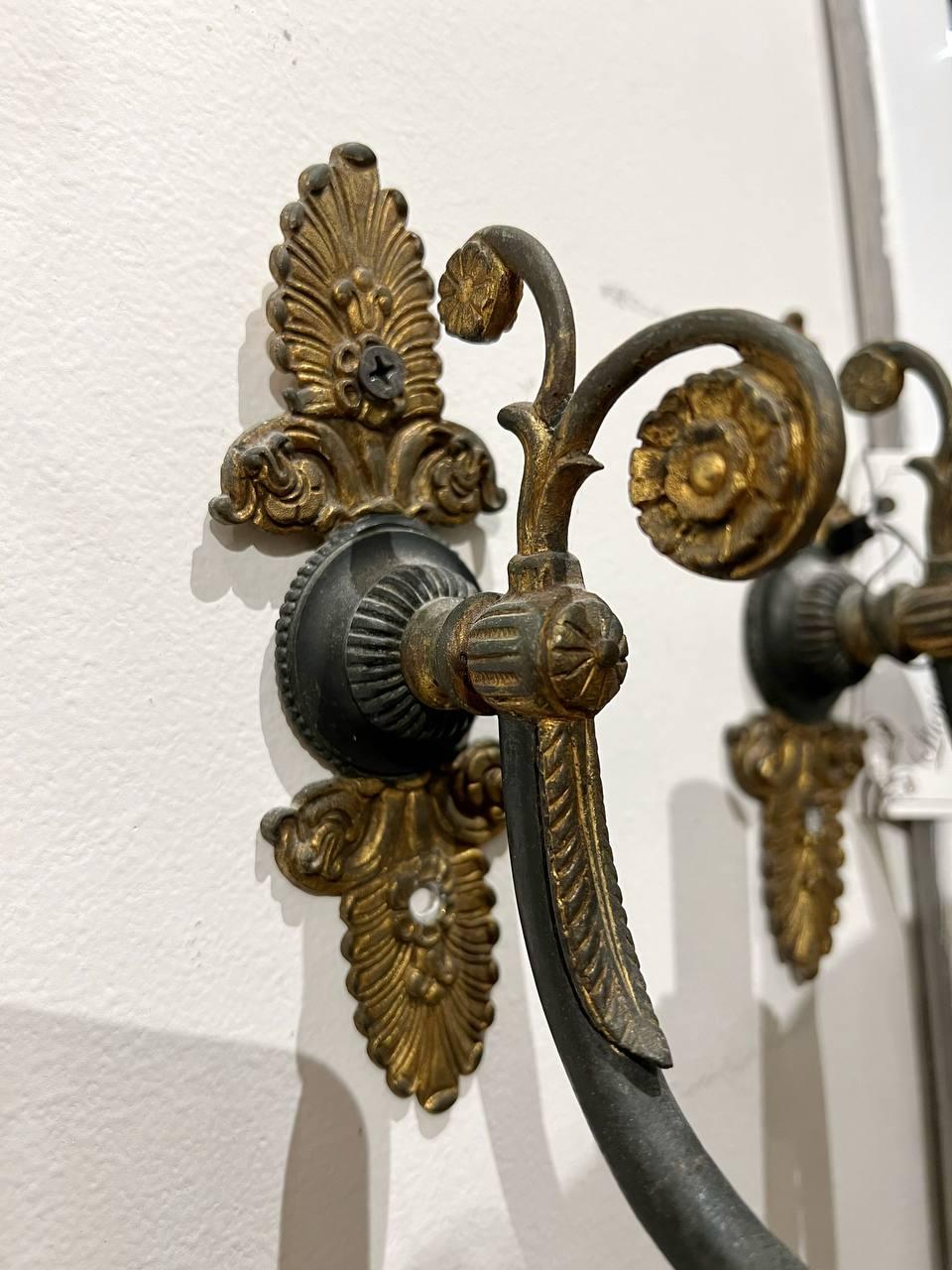 A pair of late 19th century French empire style sconces with one light 