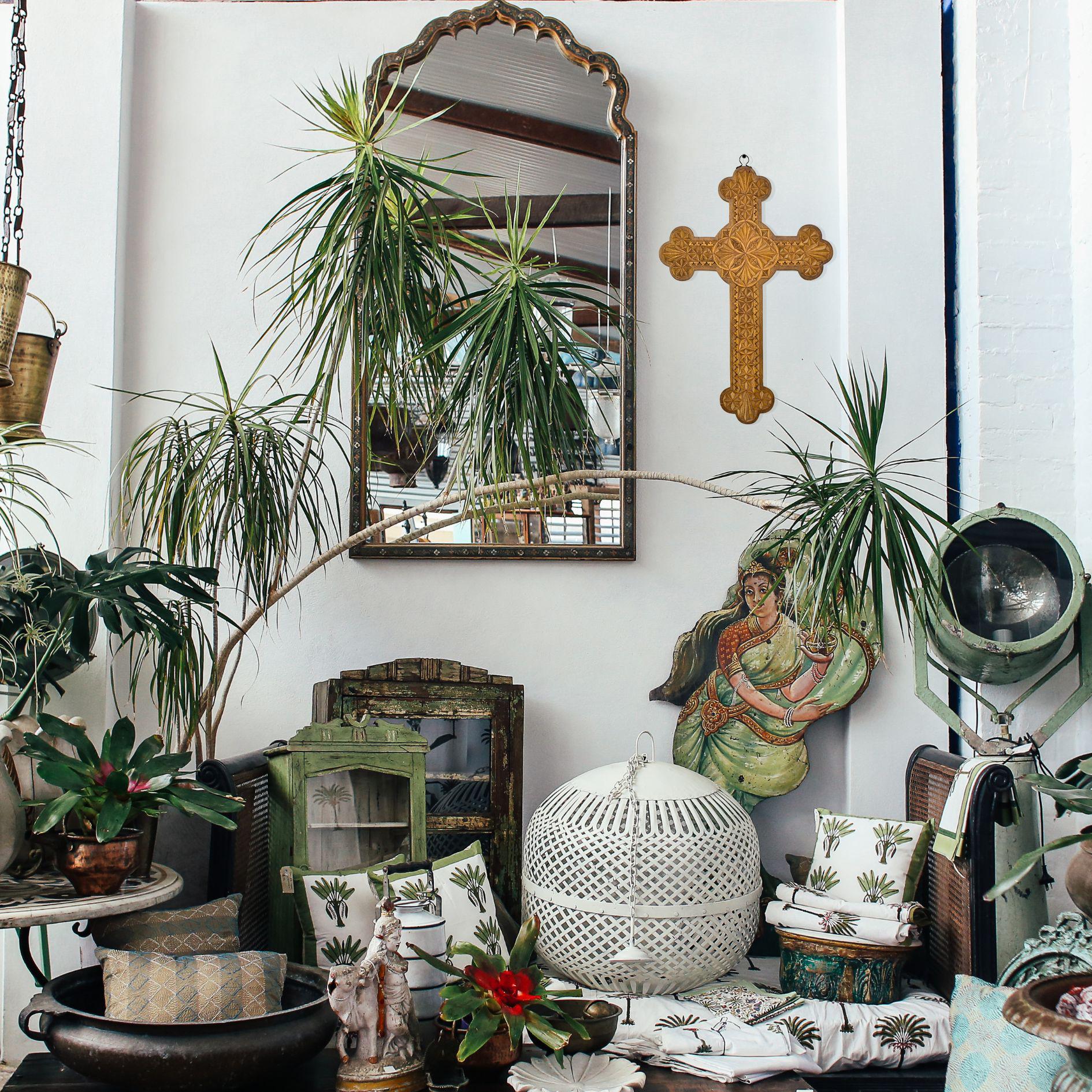 A beautiful testament to late 19th-century French Folk Art, this chip-carved wooden crucifix reflects the charm and craftsmanship of rural artisans. The intricate carvings feature geometric and floral patterns that are meticulously arranged to