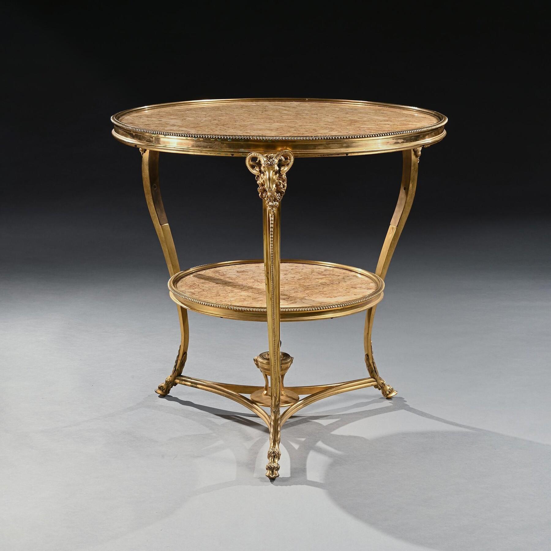 A Fine Quality Late 19th/Early 20th Century Gilt Bronze and Marble Two Tier French Gueridon with Neoclassical Detailing

French Circa 1900

Conceived in the late Louis XVI style, this table fuses the finest materials with exceptional design. Made