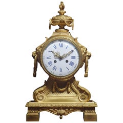 Pendule de cheminée française en métal doré de la fin du XIXe siècle