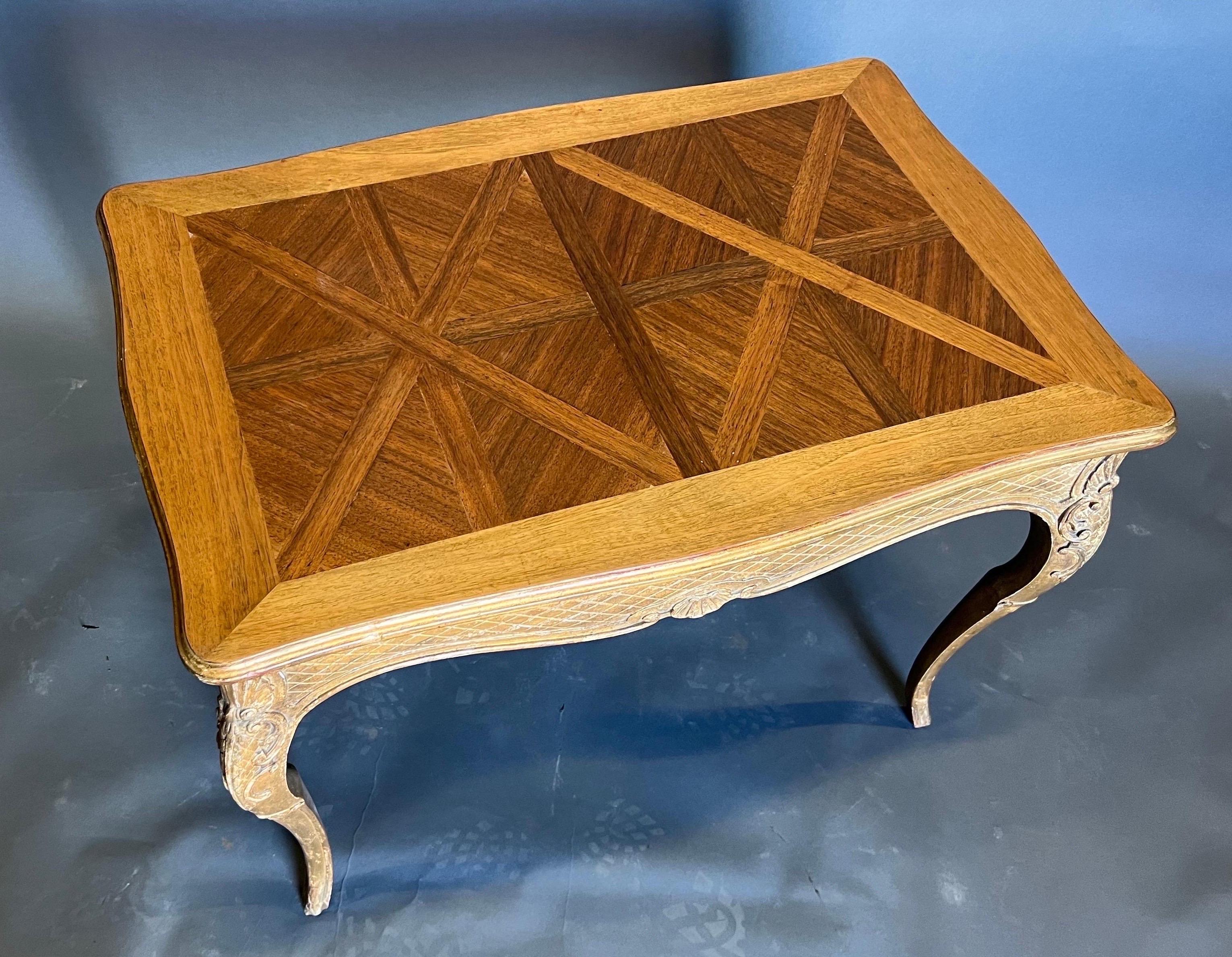 Late 19th century French gold giltwood and parquetry top table from a great estate in the Carlyle building, Manhattan