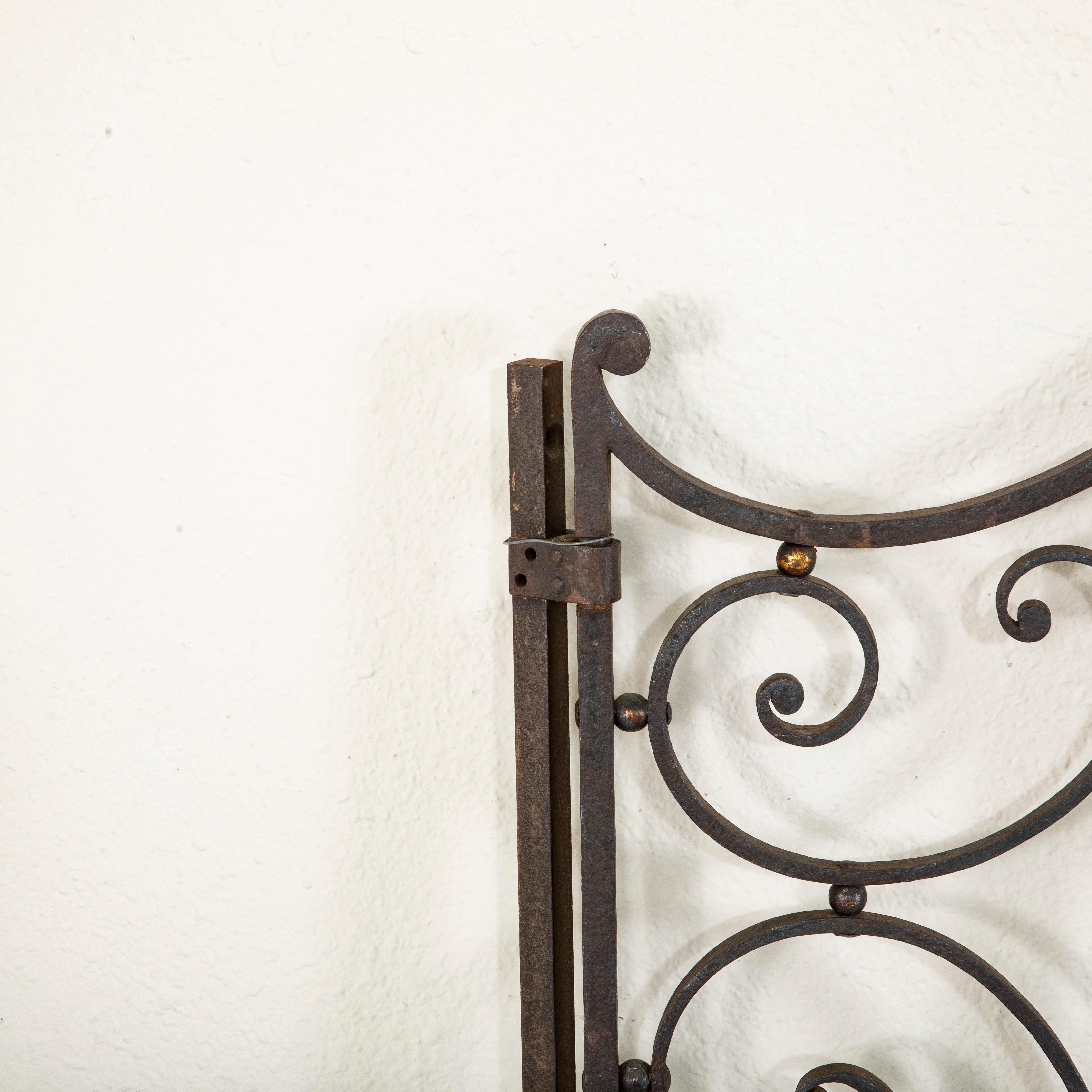 Late 19th Century French Hand Forged Iron Gate with Gold Detailing 2