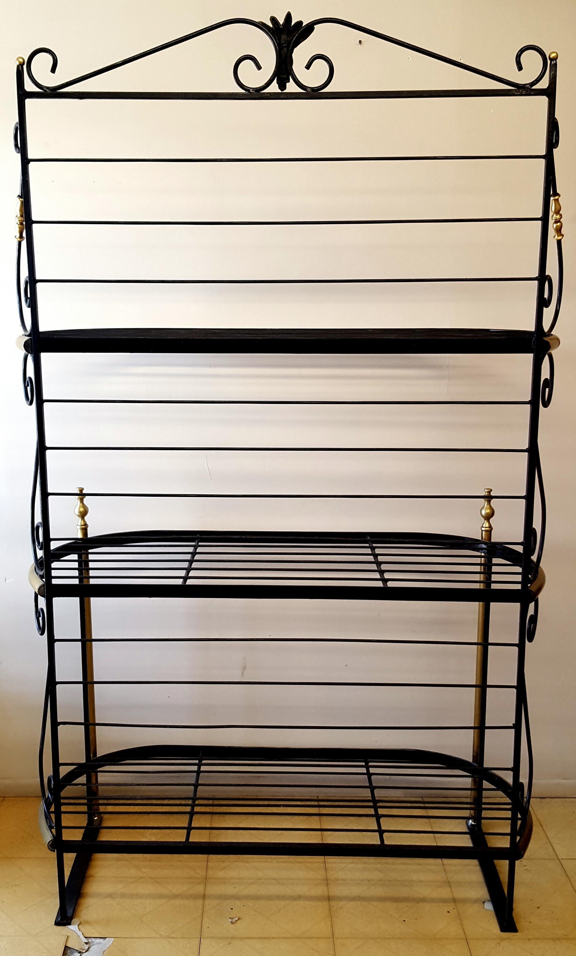 Late 19th century French Boulangerie iron display rack used to display the bakers daily selection of bread in Paris. Features brass accents 3 shelves for easy display.