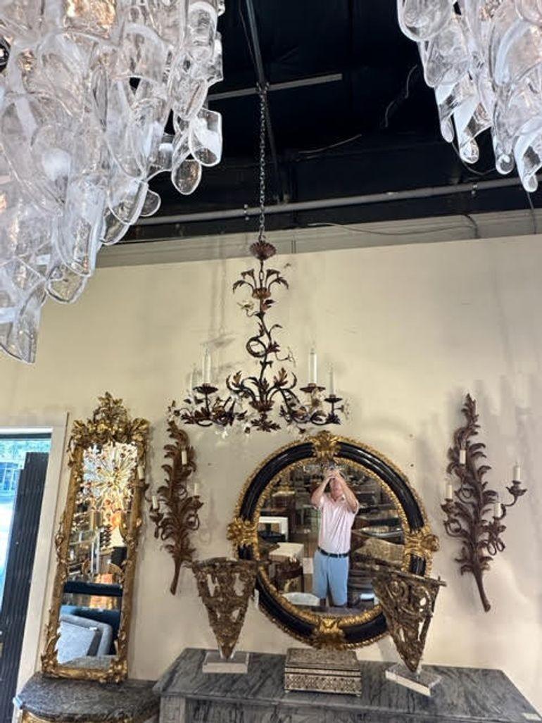 Very pretty late 19th century French iron and glass flower chandelier. Nice scale and shape with beautiful glass flowers. So light and airy!