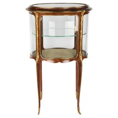 Vitrine en bois de roi et bronze doré de la fin du XIXe siècle