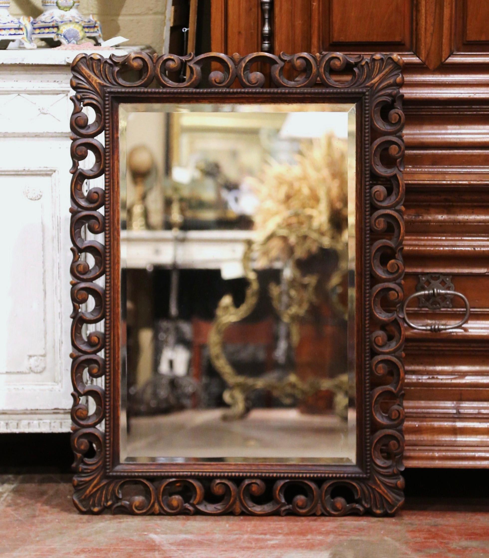 Hand-Carved Late 19th Century French Louis XIII Carved Oak Wall Mirror with Beveled Glass