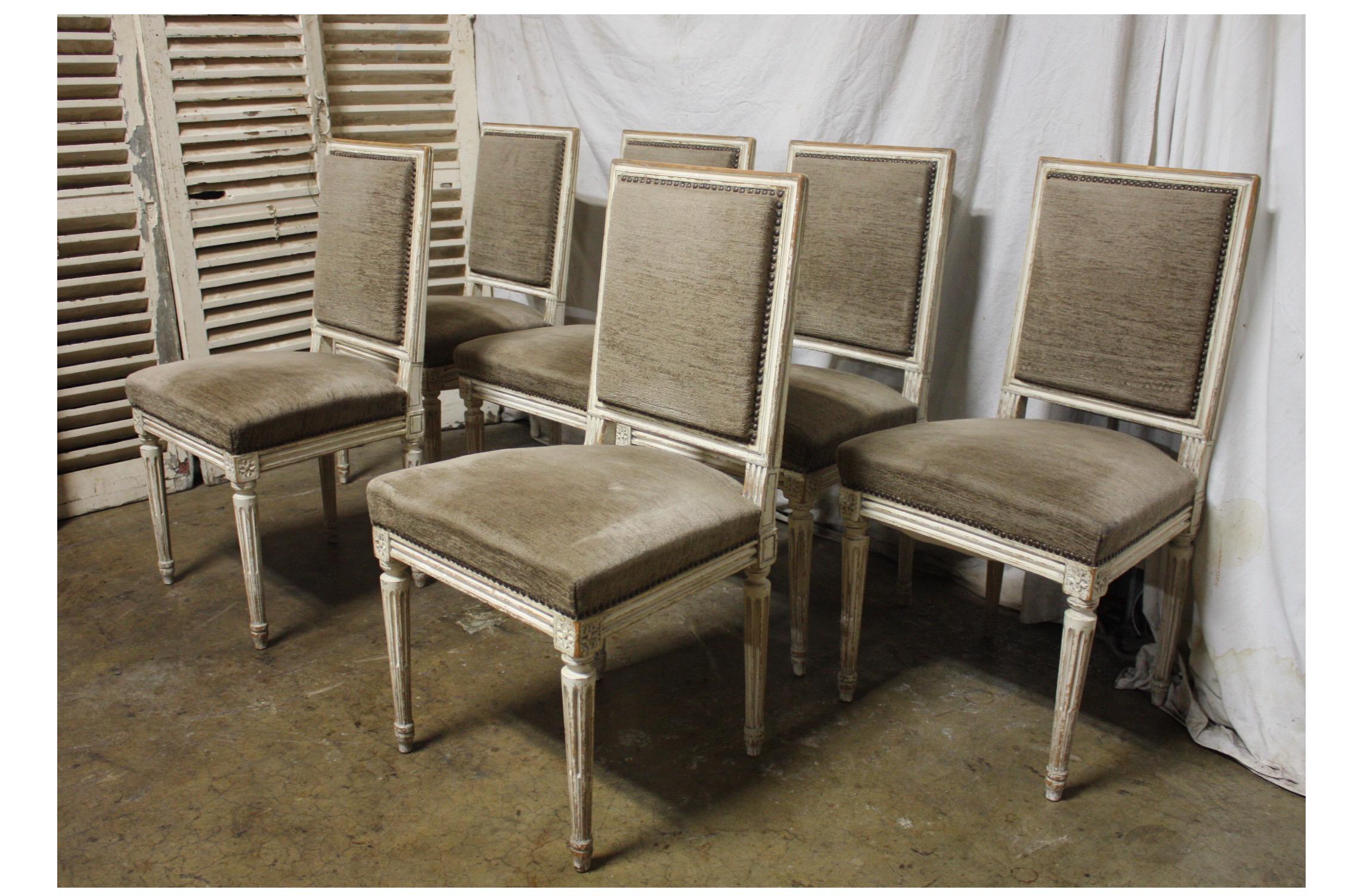 Late 19th century French Louis XVI dining chairs.
