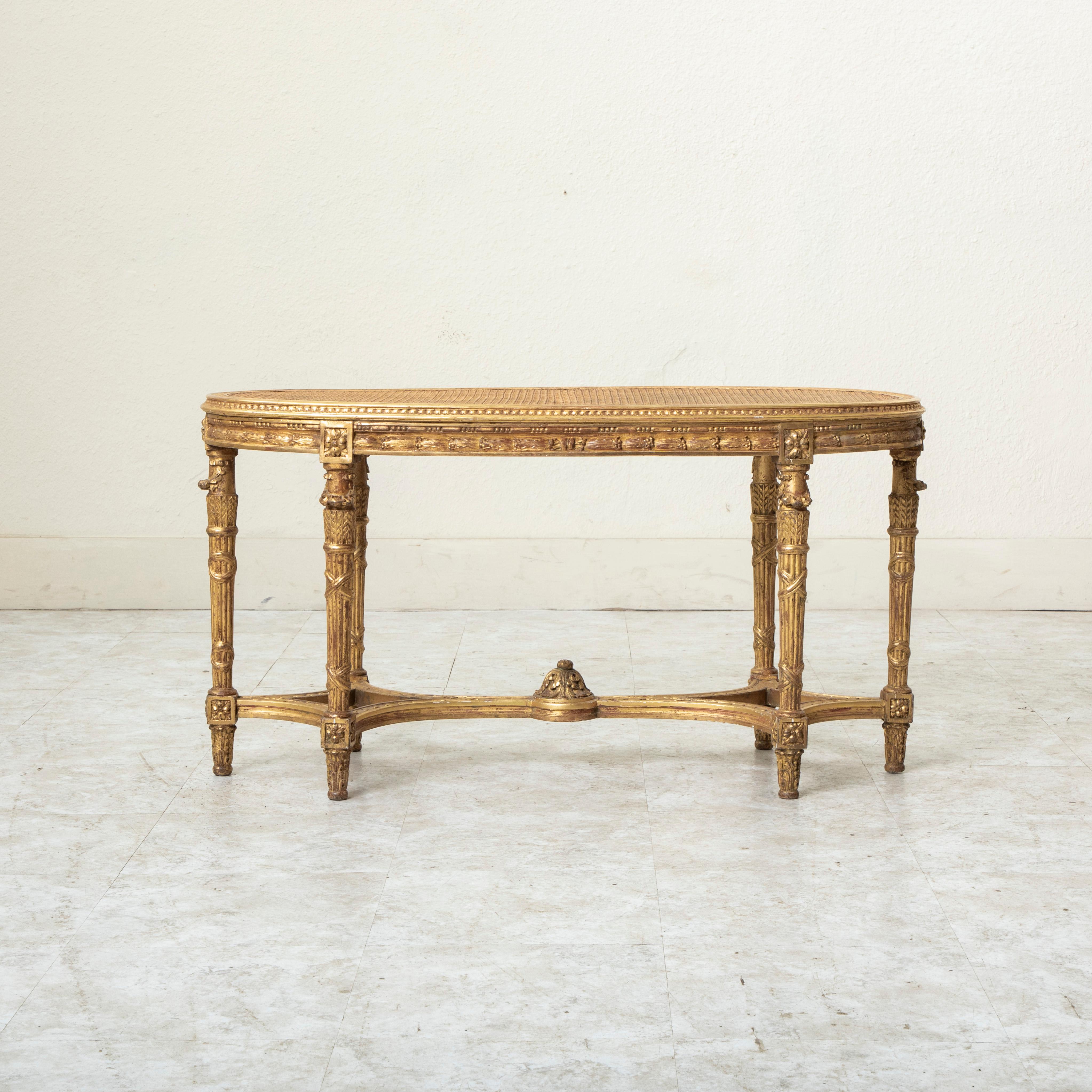 Late 19th Century French Louis XVI Style Gilt Wood Bench, Caned Seat In Good Condition For Sale In Fayetteville, AR