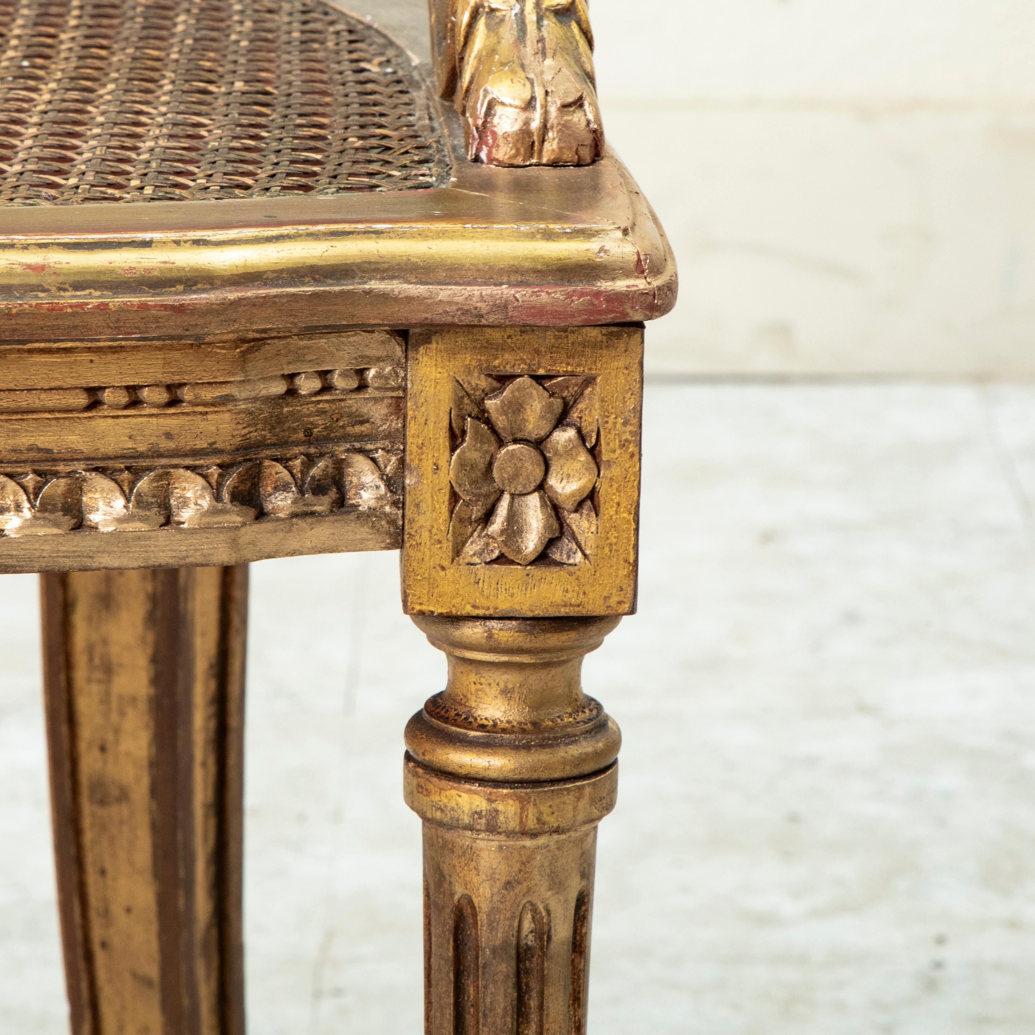 Late 19th Century French Louis XVI Style Gilt Wood Bergere Armchair with Caning 10
