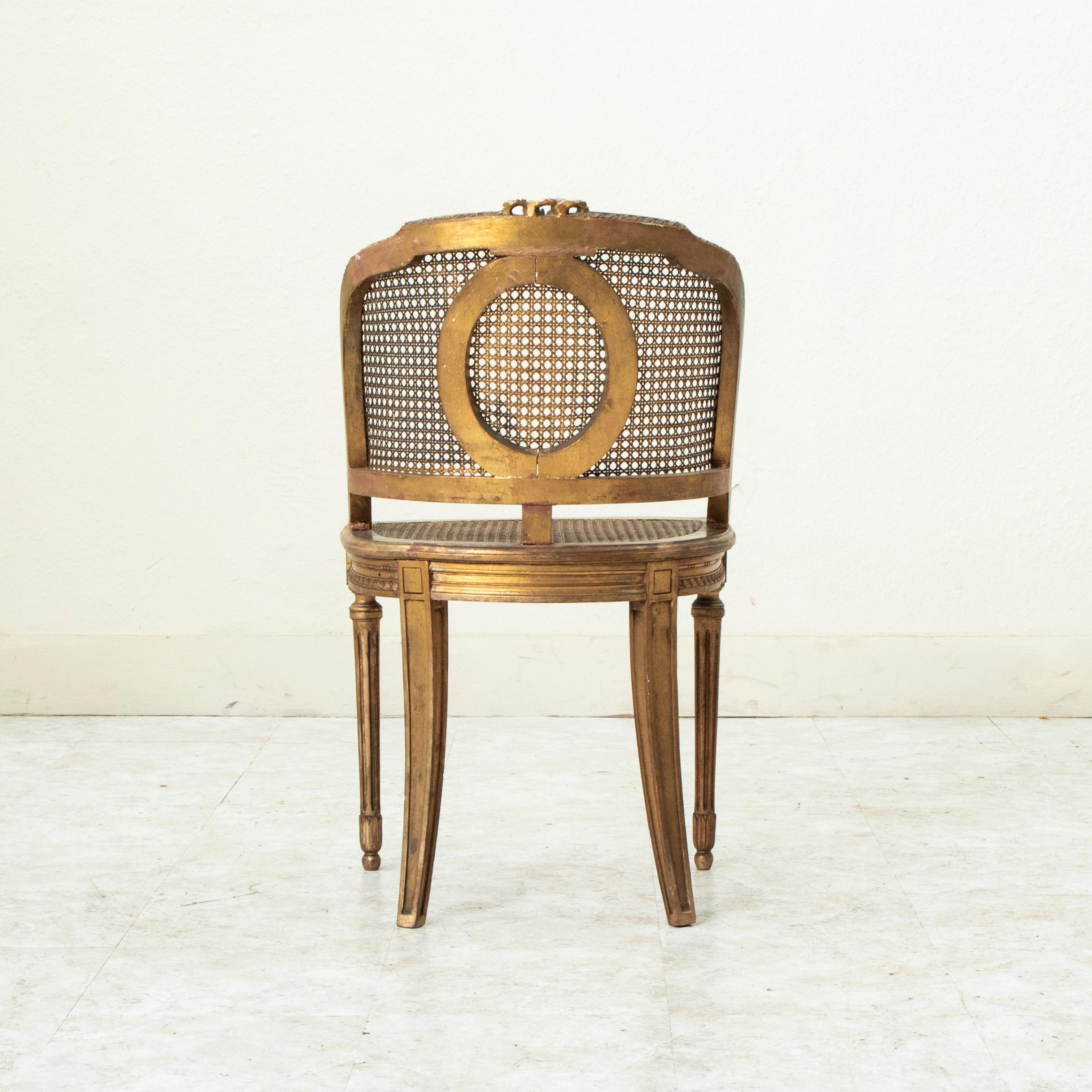Cane Late 19th Century French Louis XVI Style Gilt Wood Bergere Armchair with Caning
