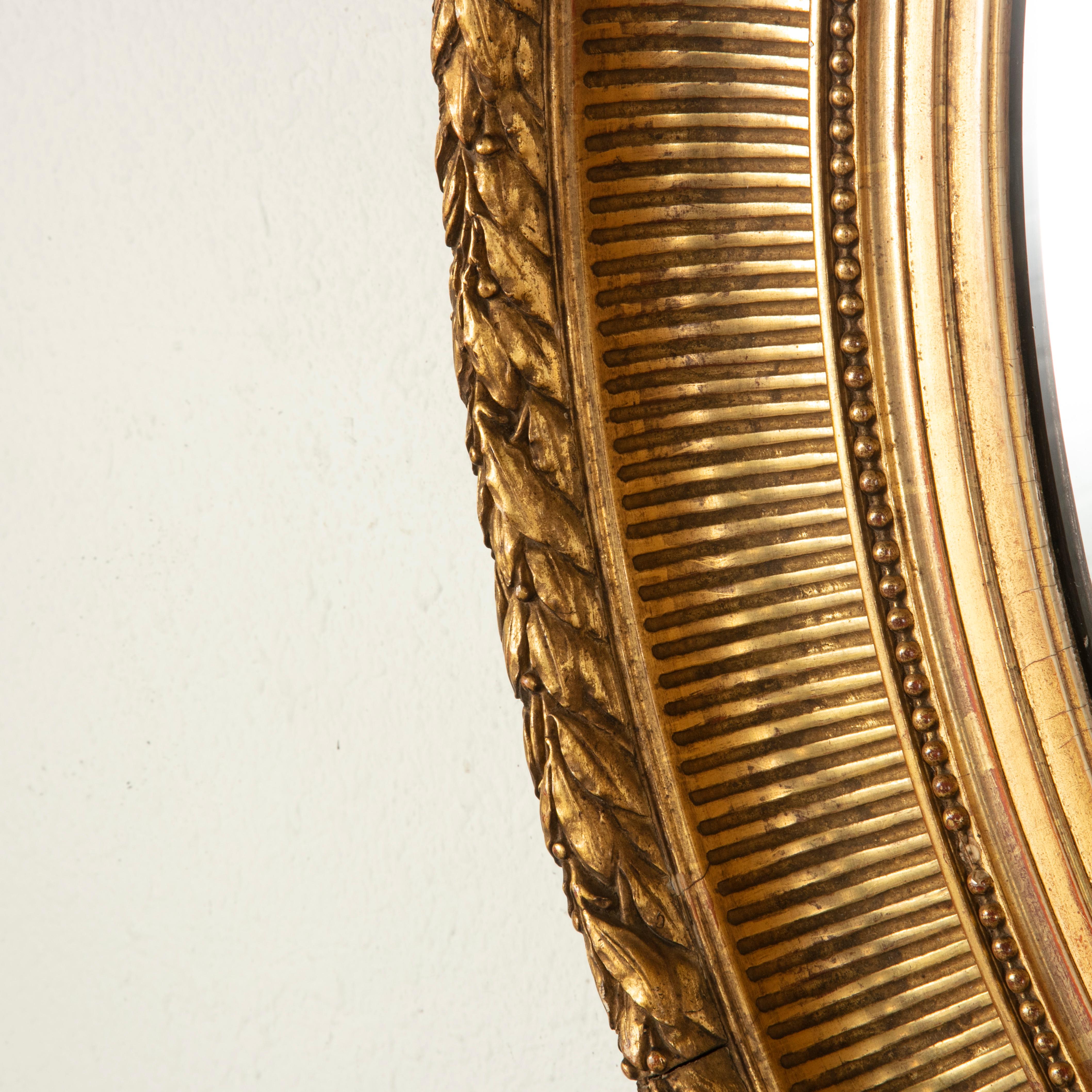 Late 19th Century French Louis XVI Style Oval Giltwood Mirror In Good Condition In Fayetteville, AR