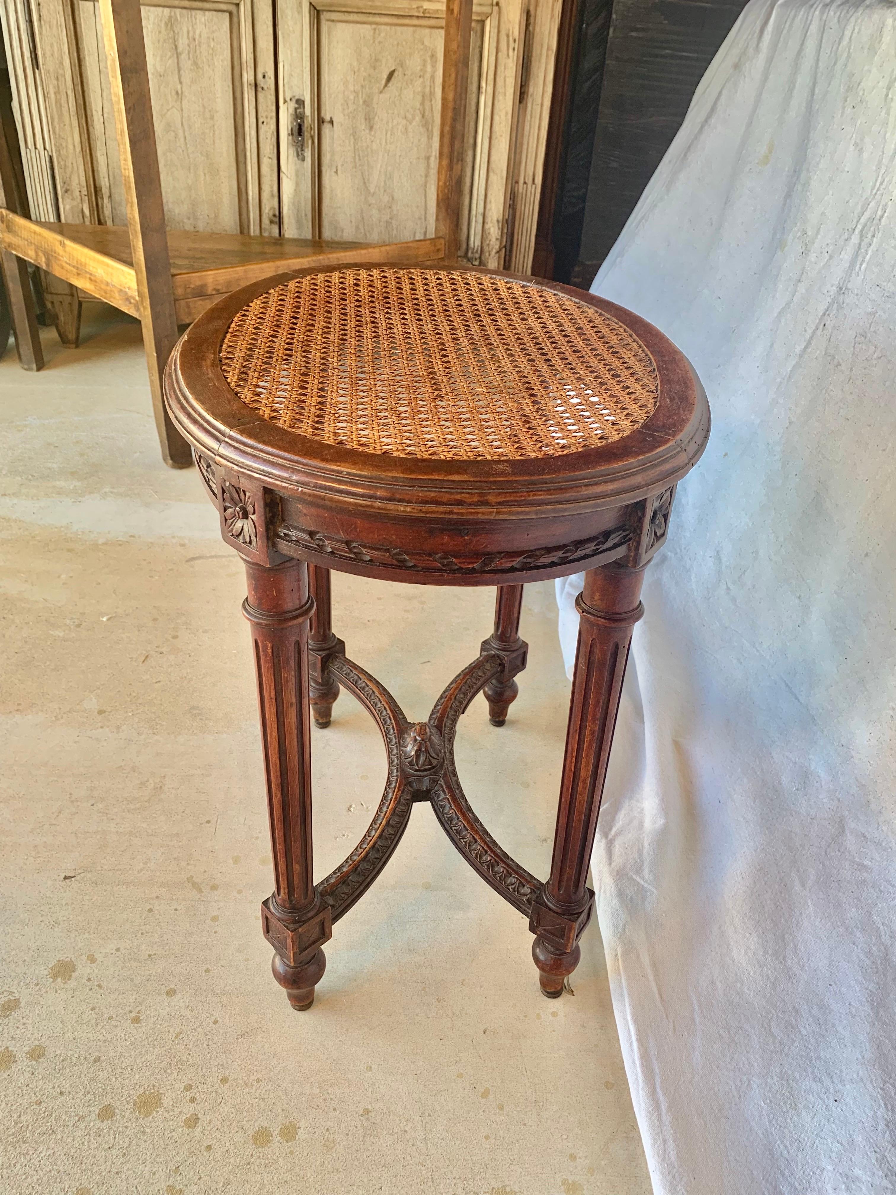 Hand-Crafted Late 19th Century French Louis XVI Walnut and Cane Stool For Sale