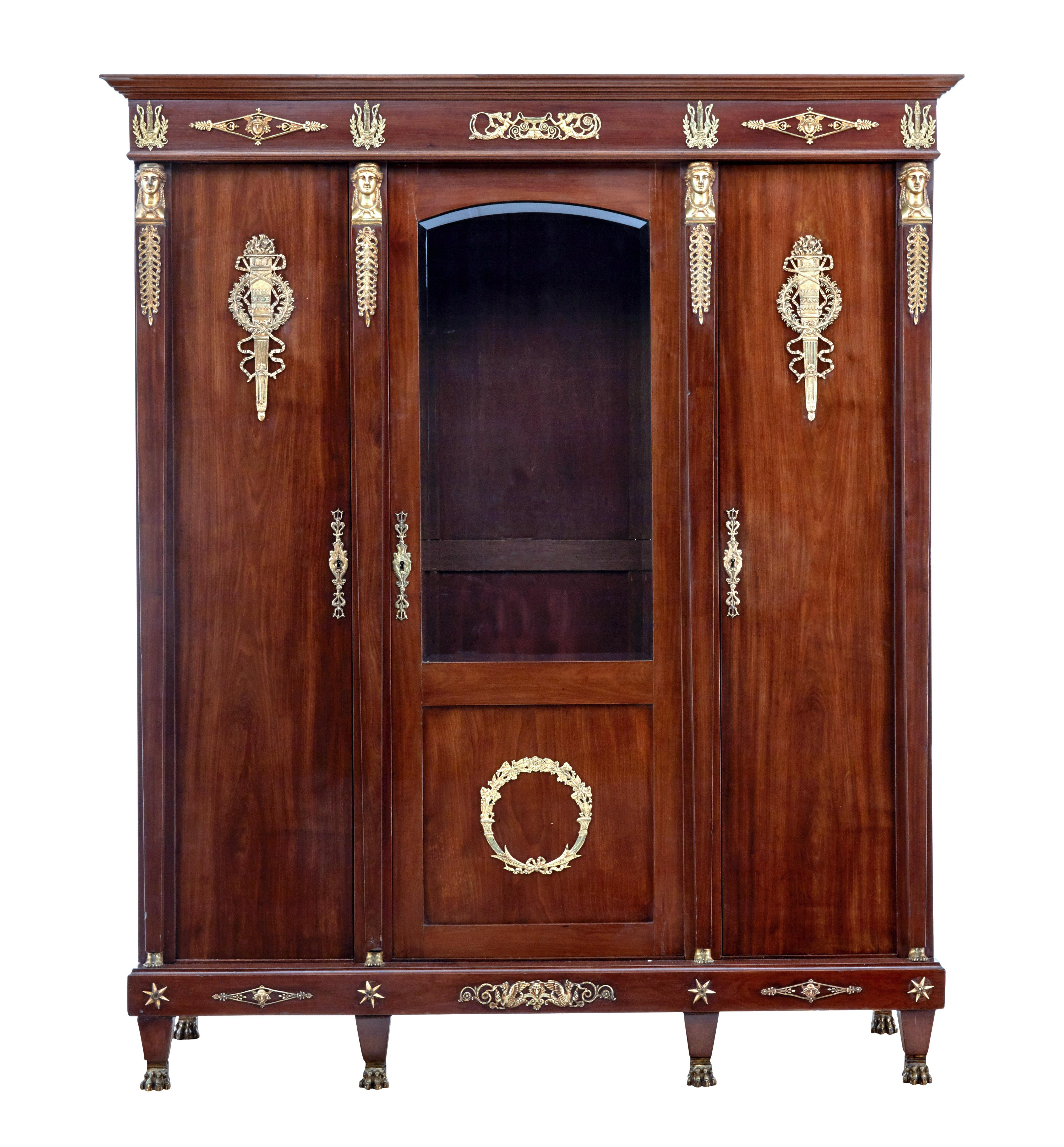 Late 19th century French mahogany and ormolu armoire, circa 1890.

Fine quality French empire revival mahogany cabinet, circa 1890.

Generous proportions and as with all furniture of this scale and period it was built to come apart.

Central