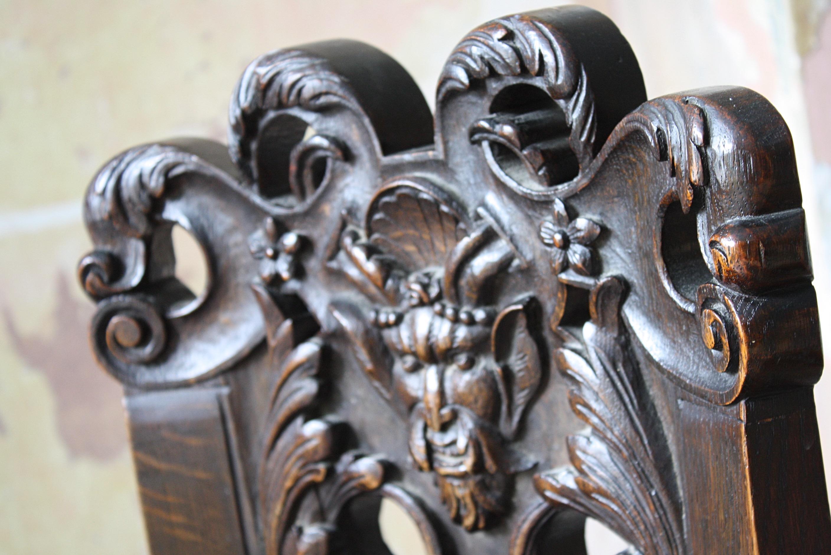 Late 19th Century French Oak Caquetoire Grotesque Pan Carved Armchairs  For Sale 6