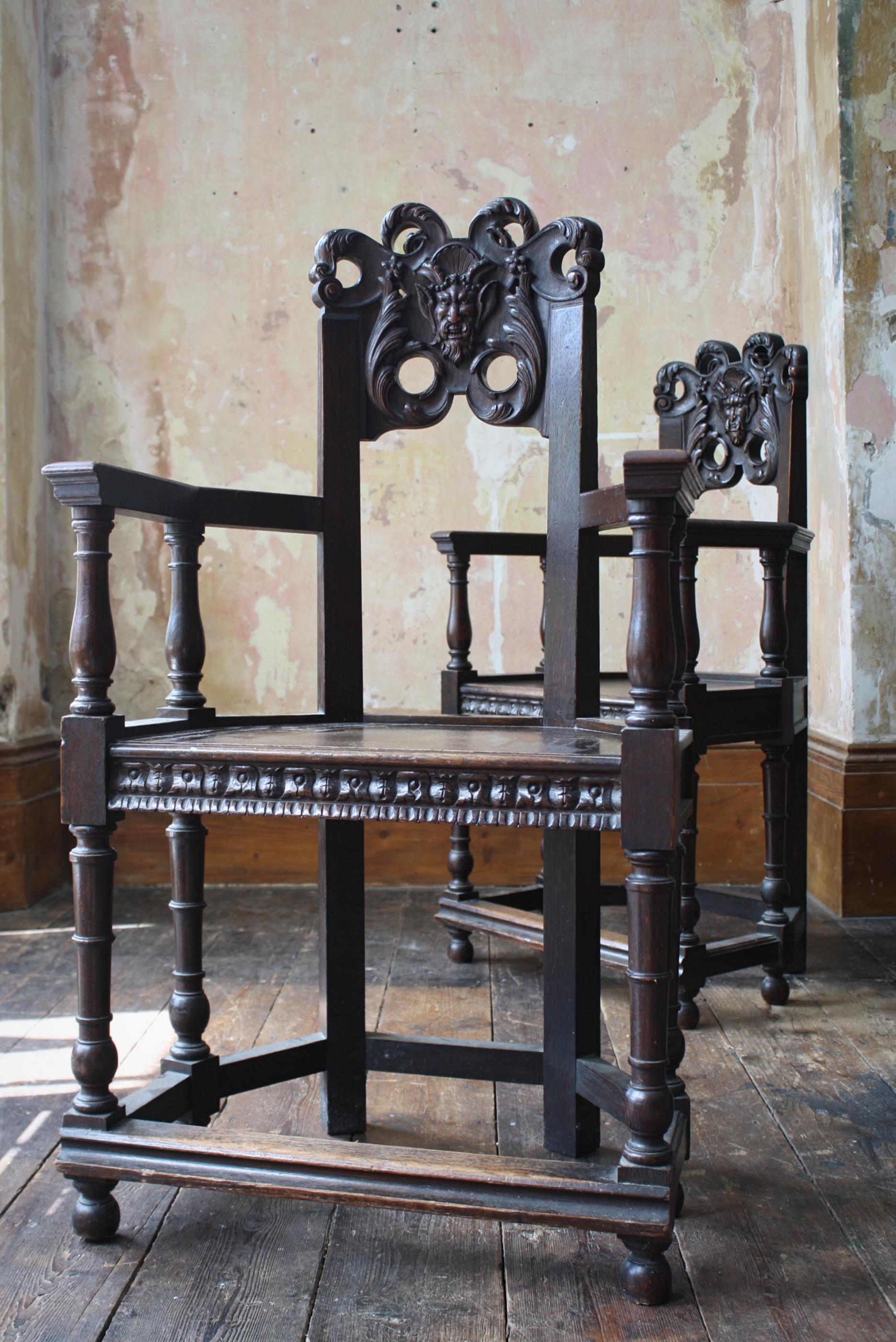 Late 19th Century French Oak Caquetoire Grotesque Pan Carved Armchairs  For Sale 7