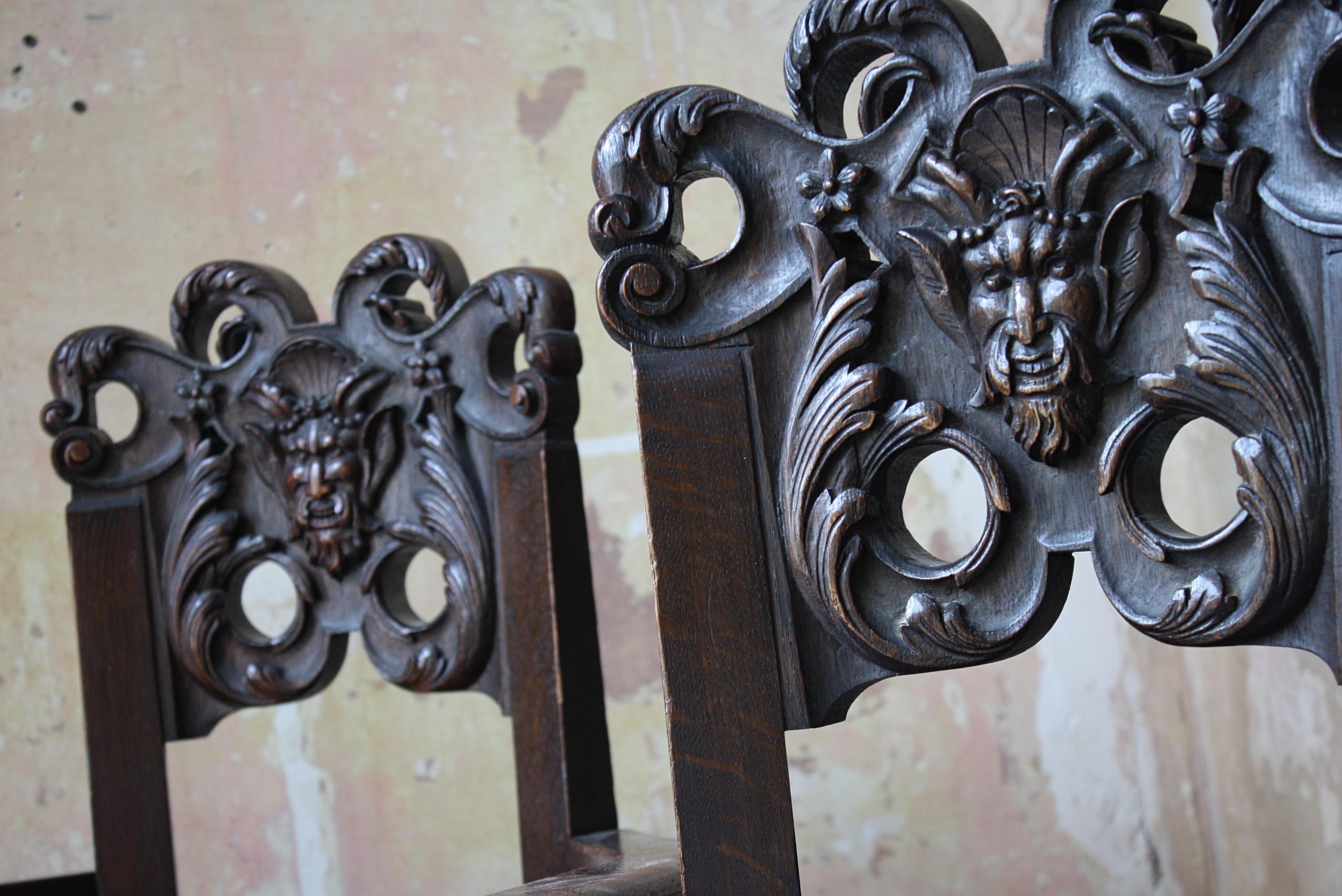 Late 19th Century French Oak Caquetoire Grotesque Pan Carved Armchairs  For Sale 1