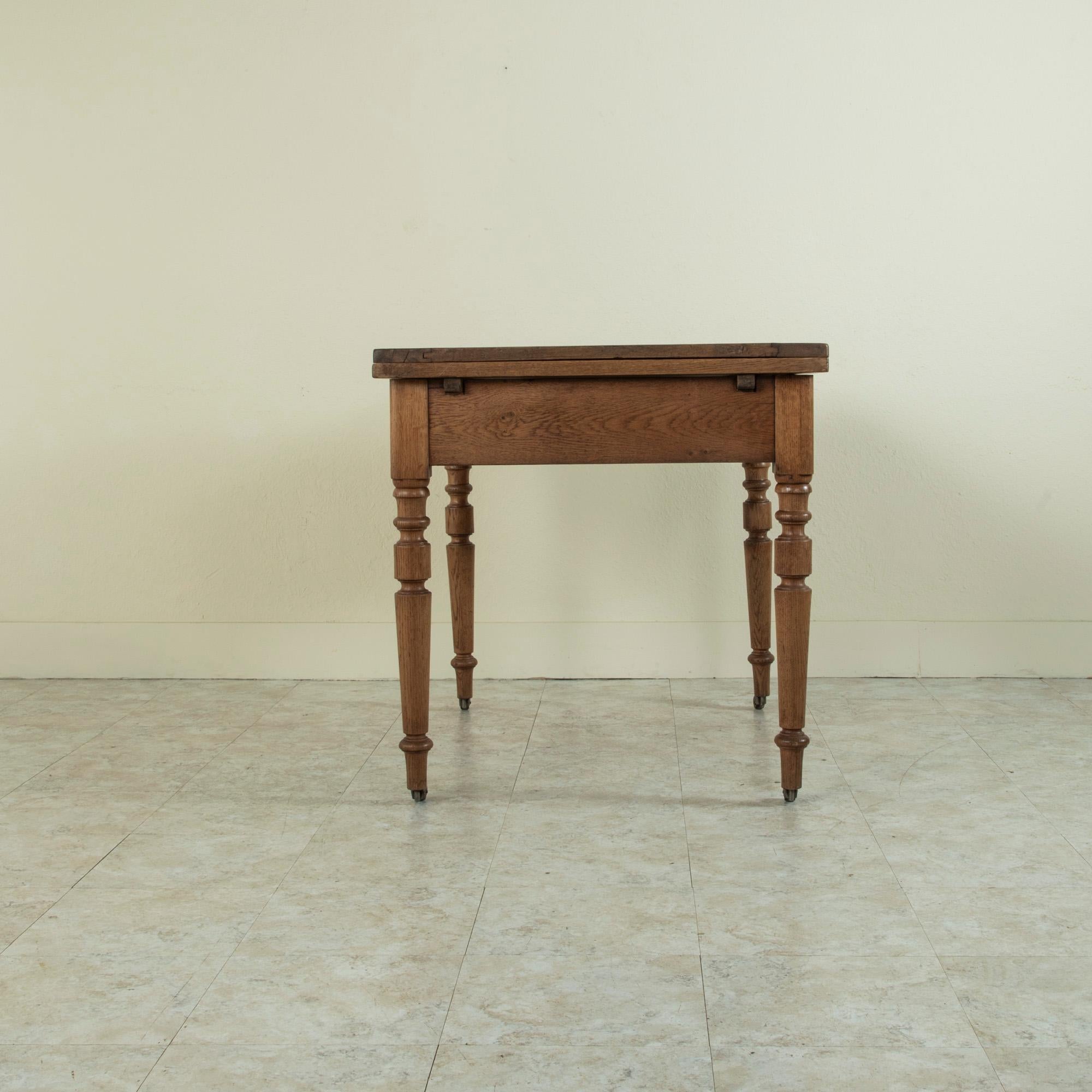 Late 19th Century French Oak Farm Table on Casters with Extendable Leaves 1