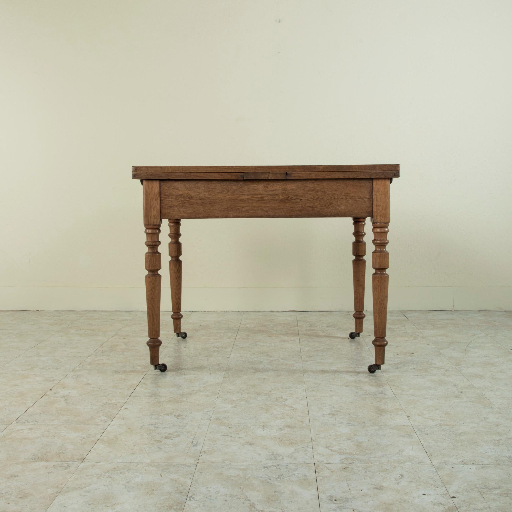 Late 19th Century French Oak Farm Table on Casters with Extendable Leaves 2