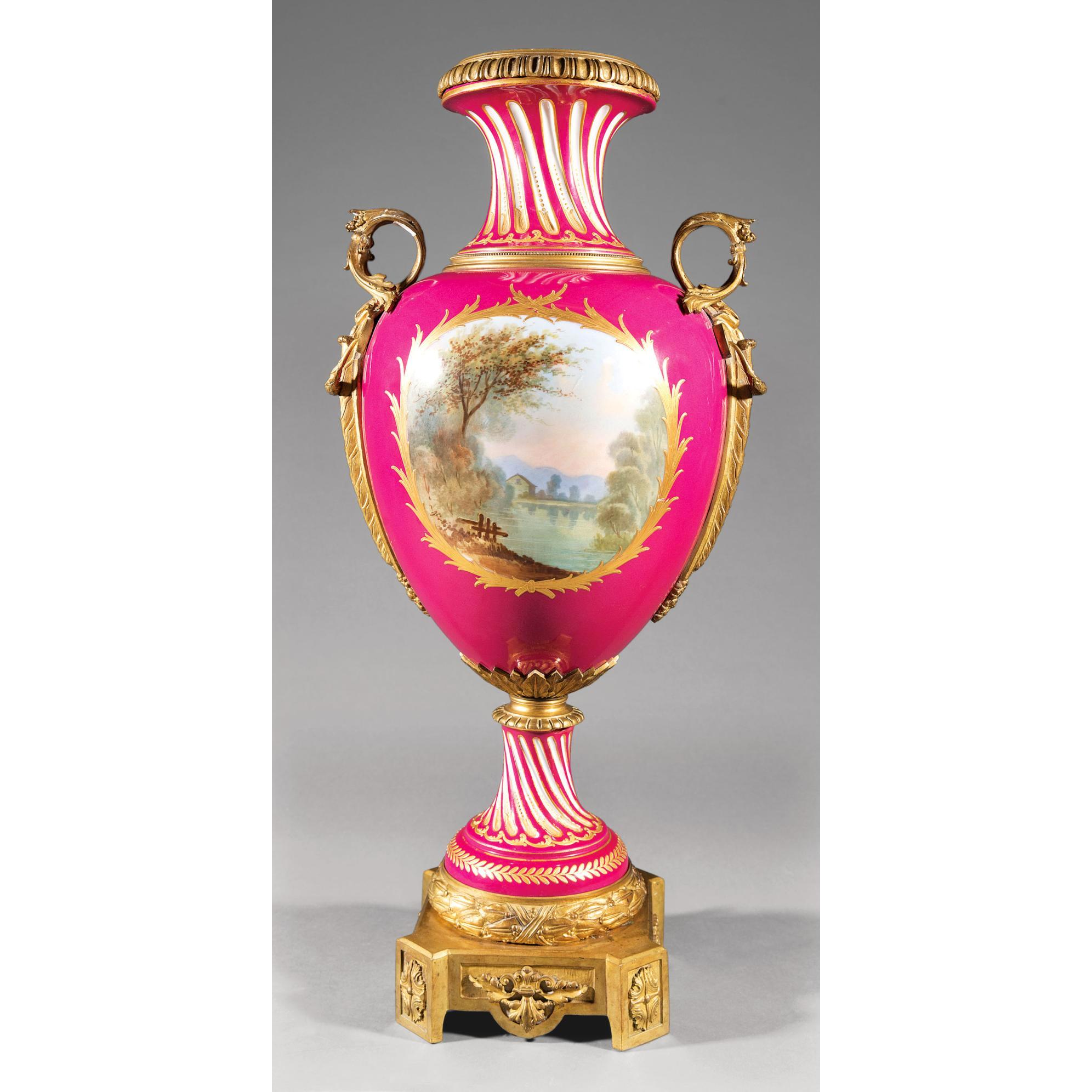 An Elegant gilt bronze-mounted Sèvres-style fuchsia ground porcelain urn with classical painting. Decorated with Classical figures and an idyllic landscape within raised gilt cartouches on a fuchsia ground; bronze beaded and foliate rims, foliate