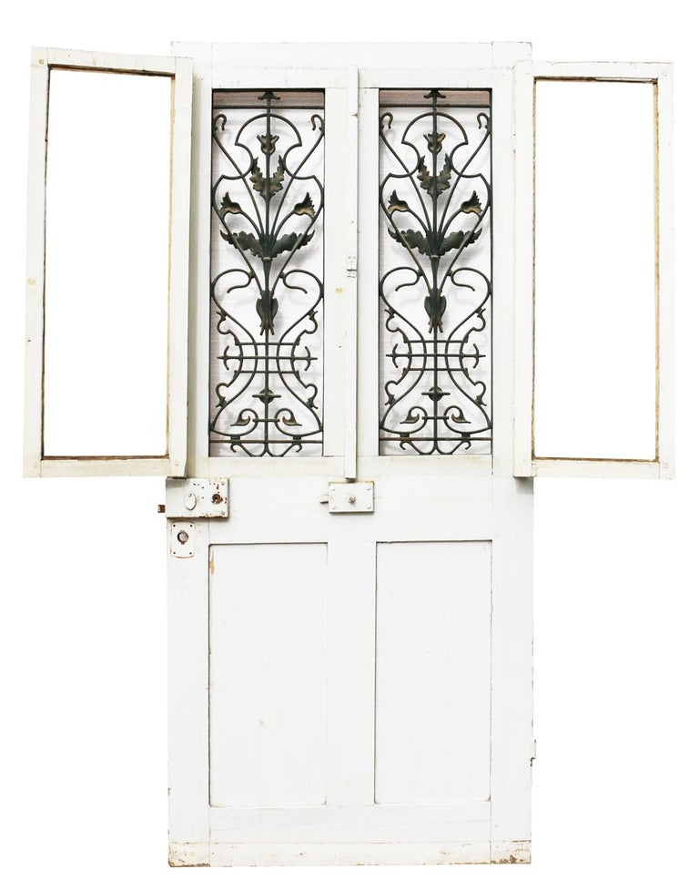Late 19th Century French Painted Pine Front Door with Cast Iron Grills