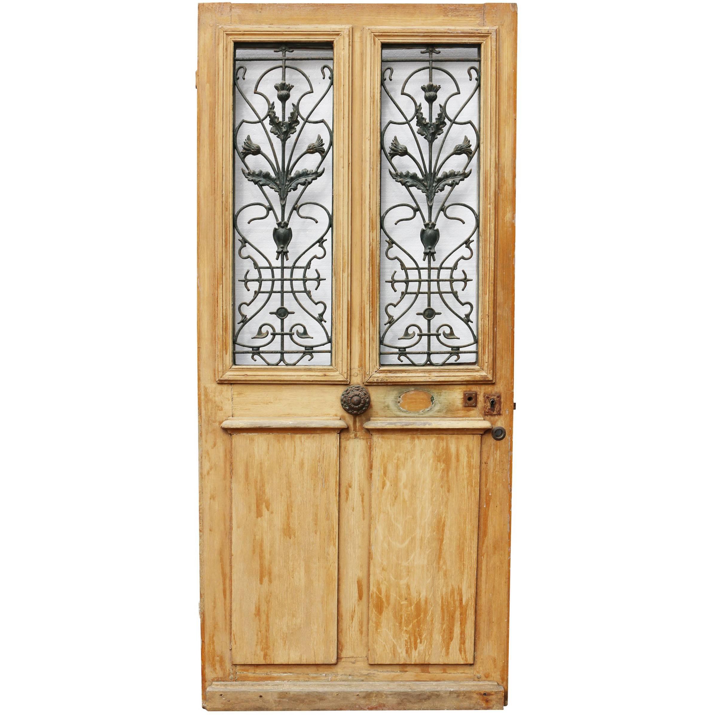 Late 19th Century French Painted Pine Front Door with Cast Iron Grills
