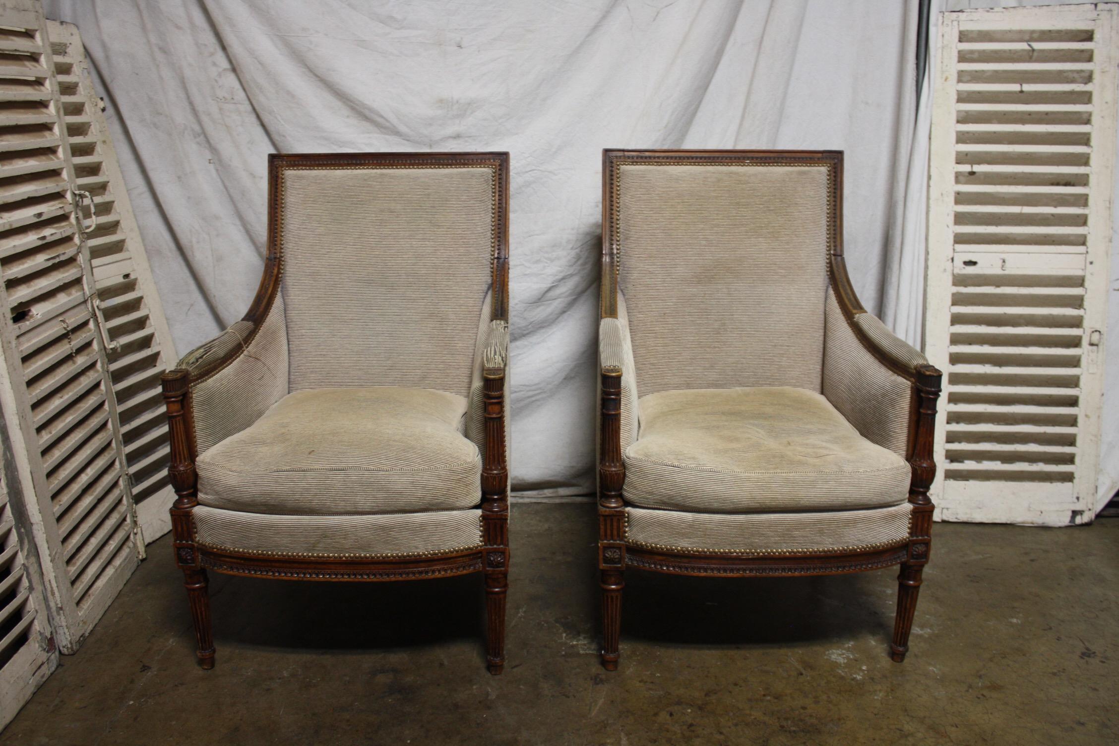 Late 19th century French pair of bergere chairs.