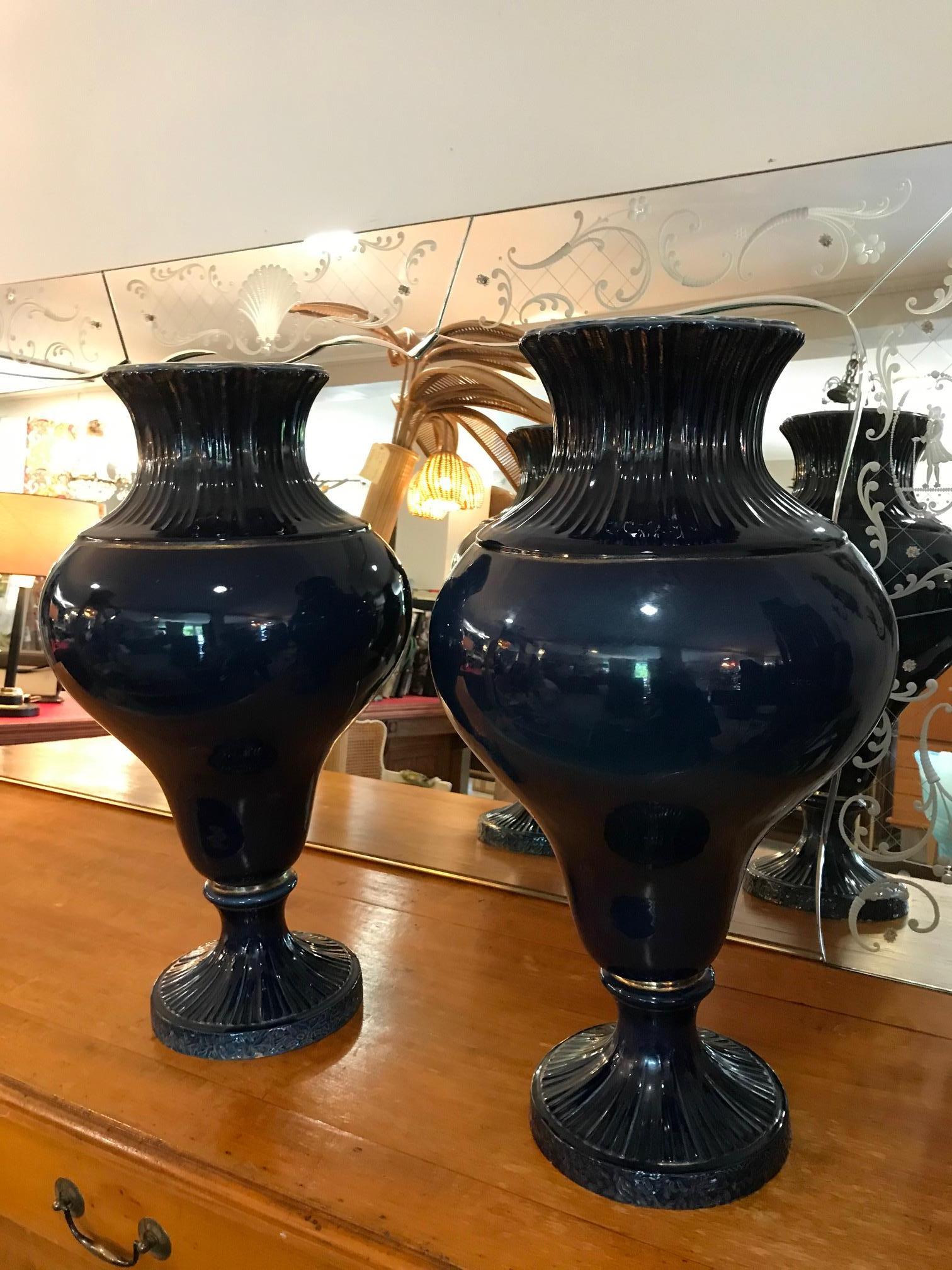 Beautiful late 19th century large French pair of blue faience vases. 
Nice blue color and golden line. Very good condition.
 