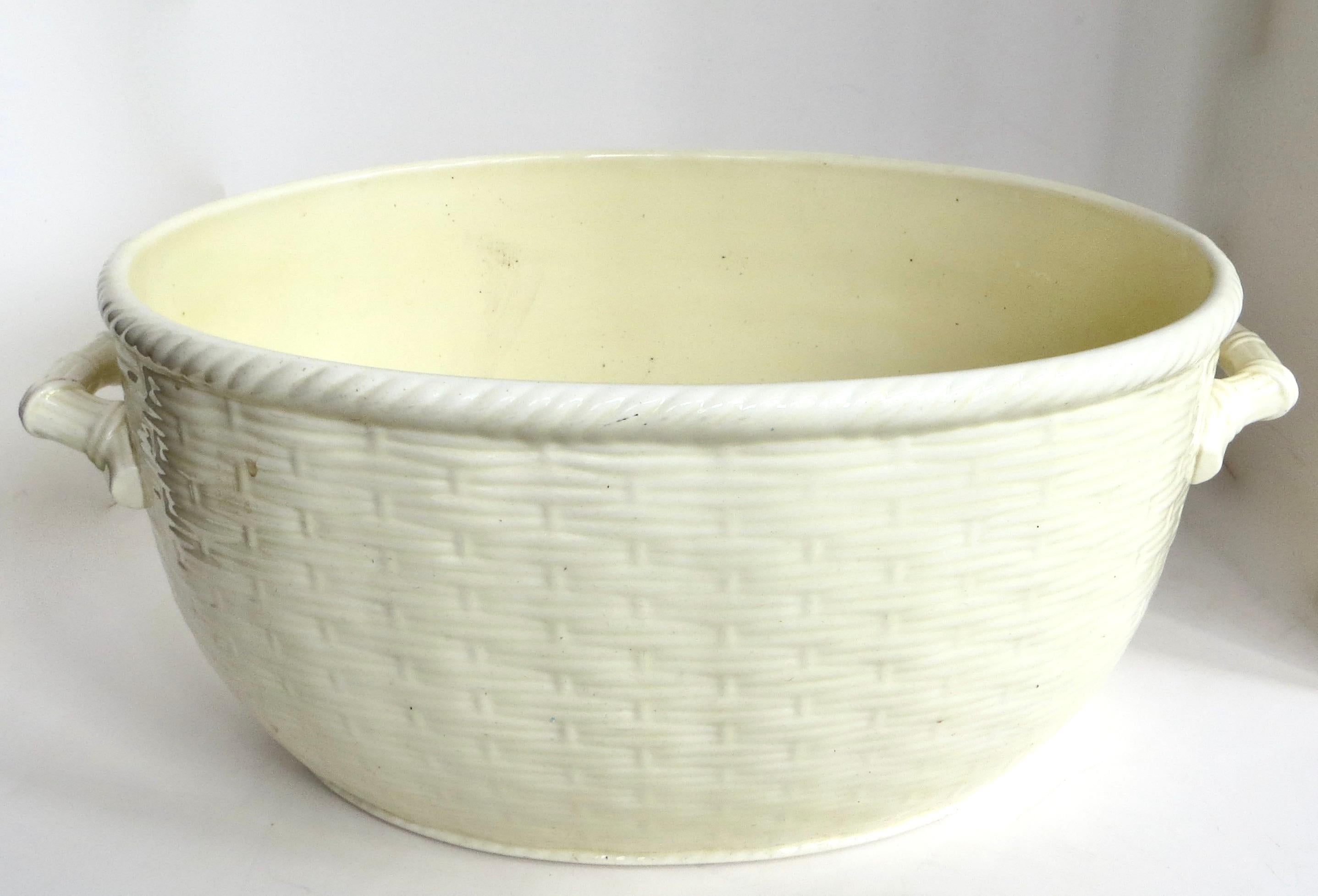Lovely all original French Provincial late 19th century porcelain slight oval shaped large sized window planter measuring  with a beautiful basket weave pattern around the entire planter and a rope turned top perimeter motif around the entire