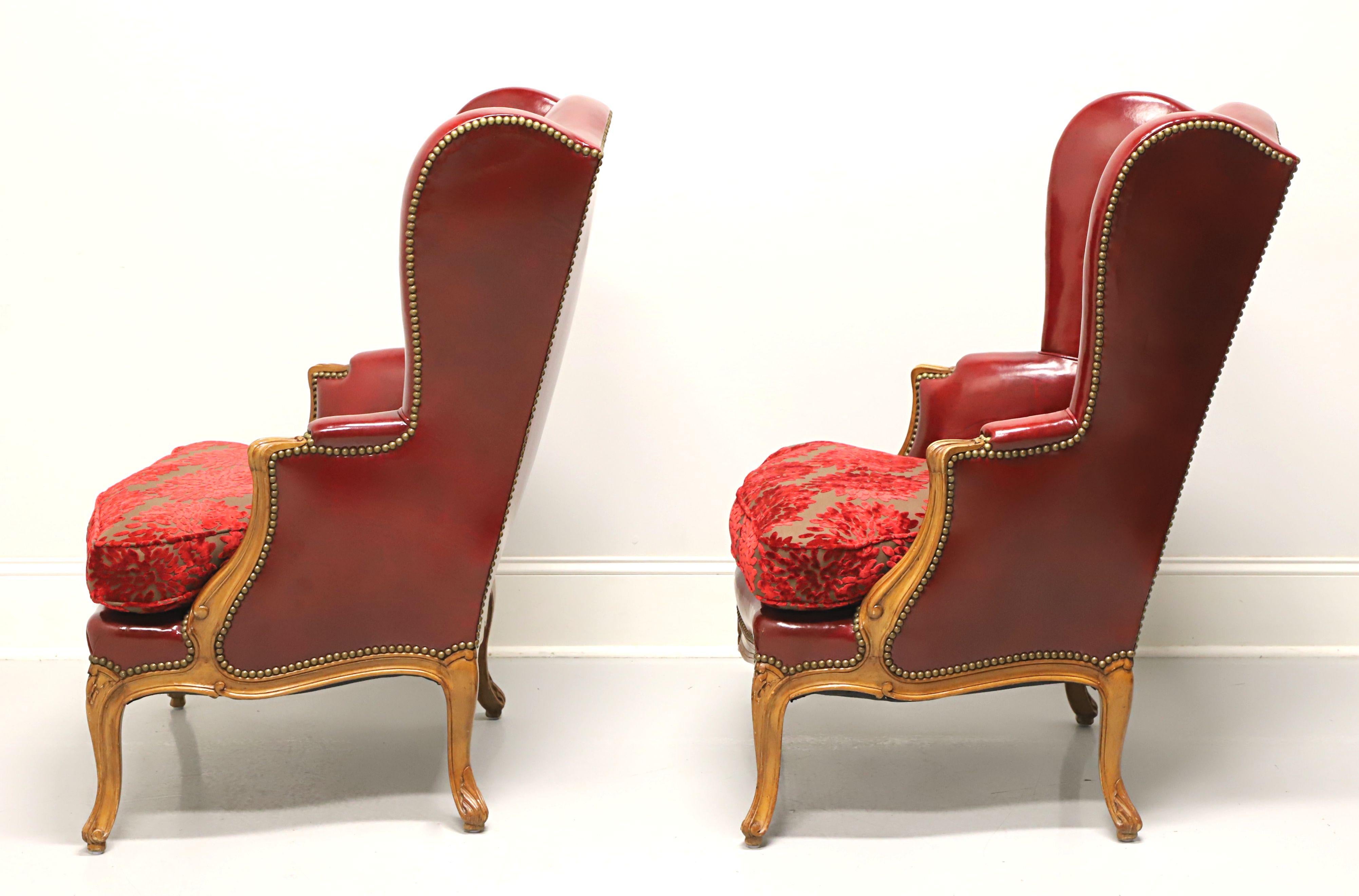 Late 19th Century French Provincial Louis XV Red Leather Wing Back Chairs - Pair 1