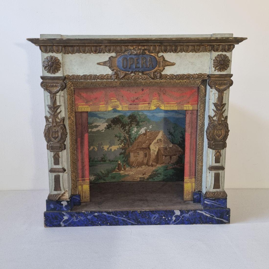 Fabulous and extremely rare small puppet opera theater with great color and its curtain,
As visible on the photo's 3 scenes are present.
France, circa 1880-1900.
Weathered, small losses and old repairs.
Treated against wood worm.