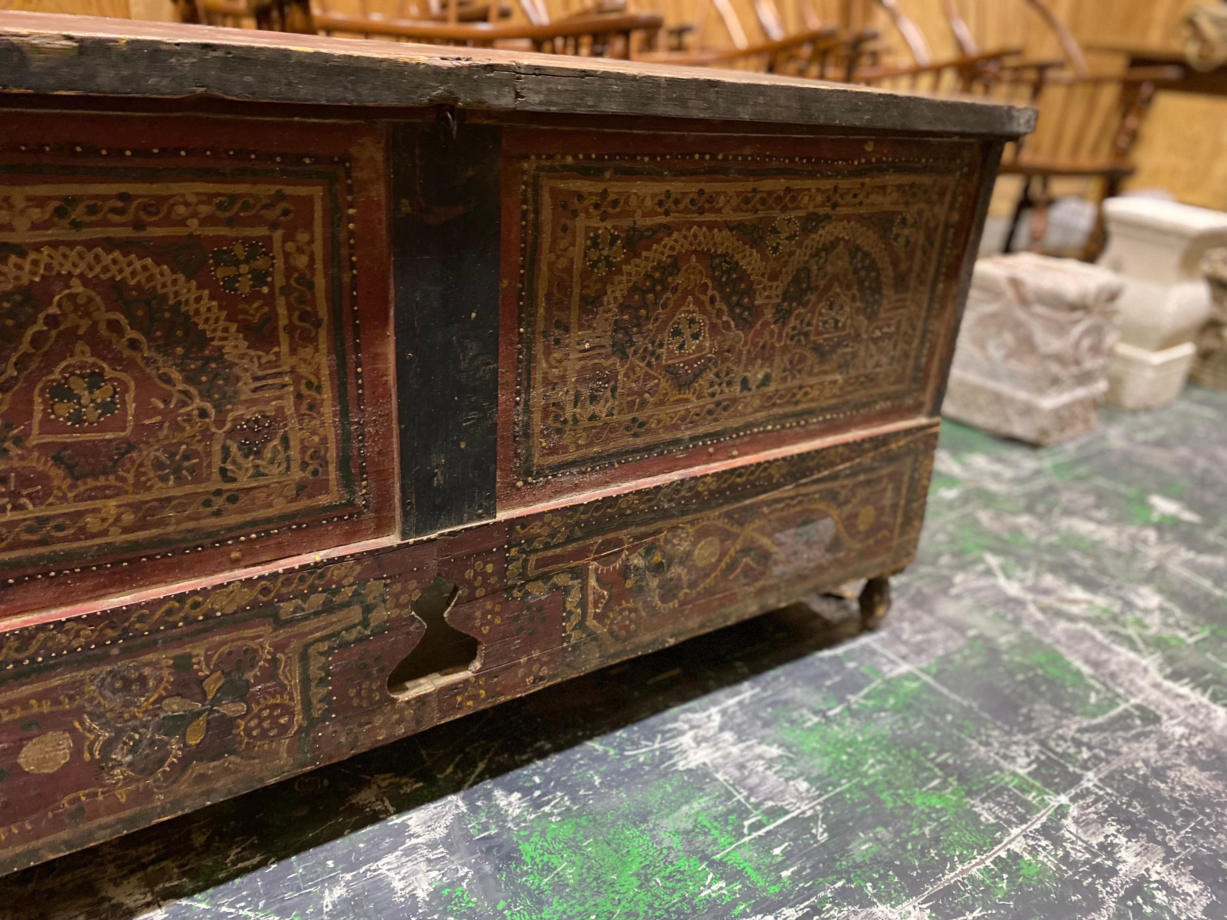 Wood Late 19th Century French Red Painted Blanket Chest with Elaborate Decoration For Sale