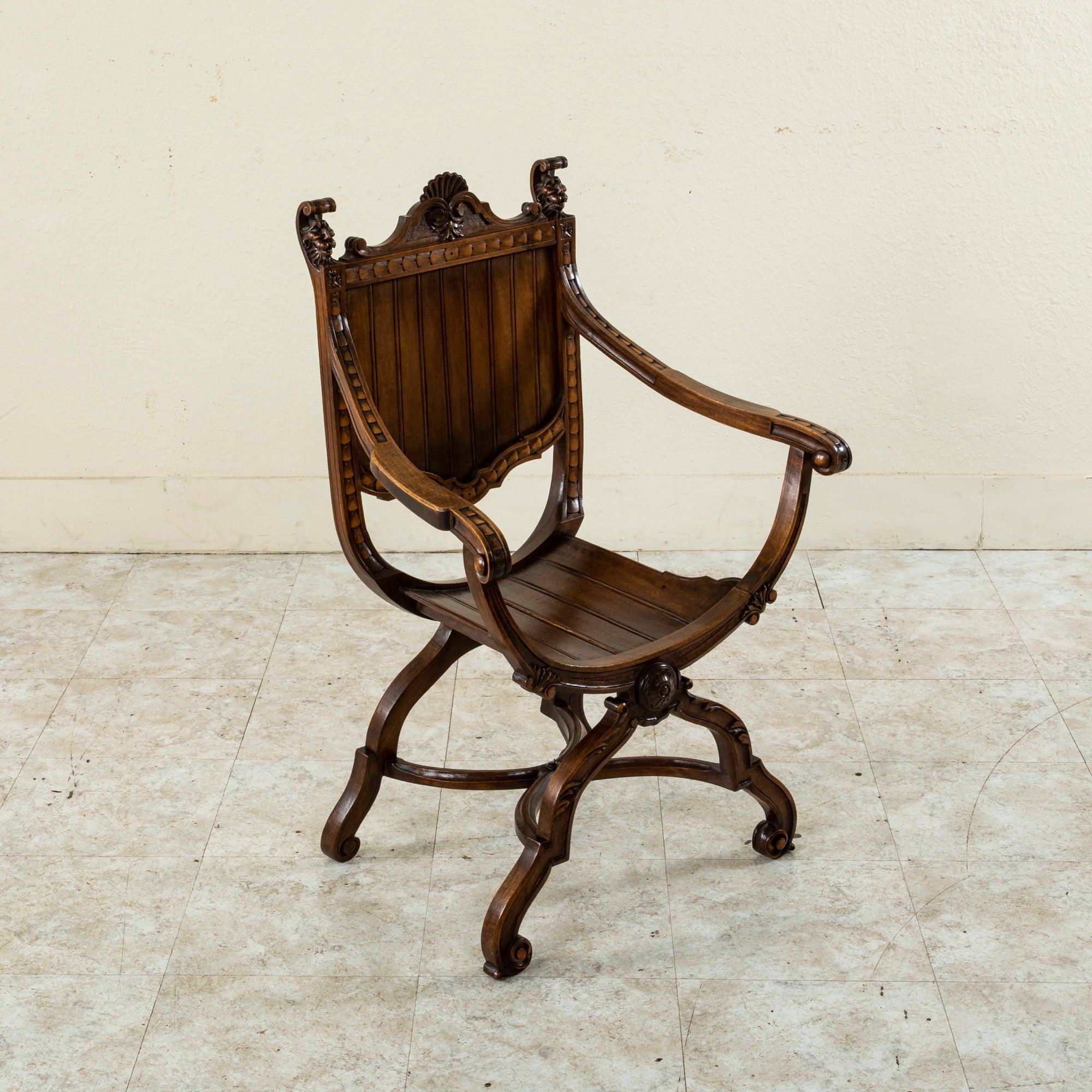 Of a rare smaller scale, this late nineteenth century French Dagobert chair was originally used by a young lady for needlework. The Dagobert chair is so named after the throne chair of King Dagobert I, the French king who reigned during the seventh