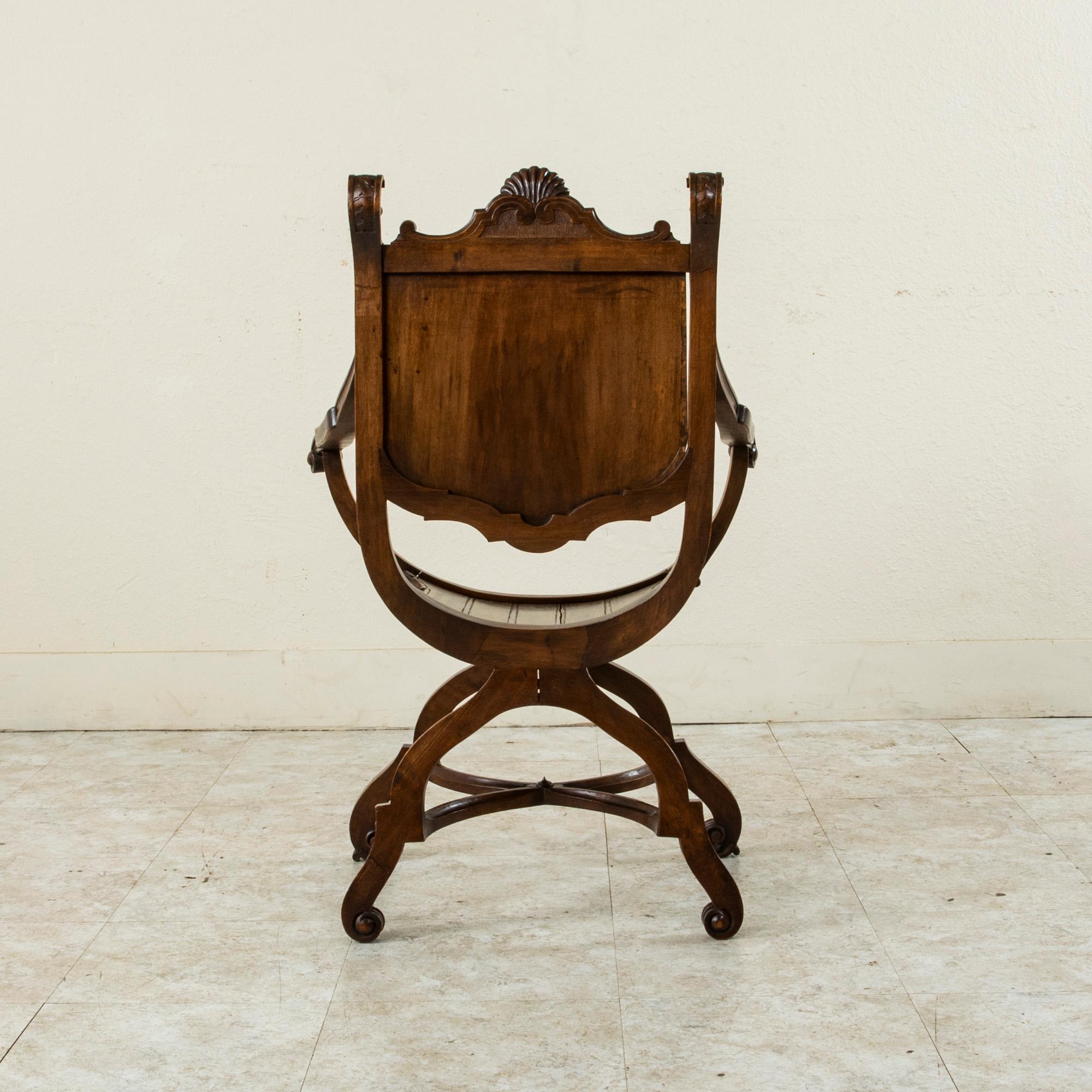 Medieval Late 19th Century French Renaissance Style Hand Carved Walnut Dagobert Chair For Sale