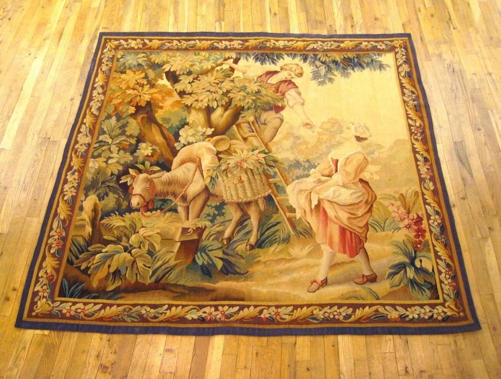 A French Aubusson Rustic tapestry from the late 19th century after an original painting by the French painter François Boucher (1703-1770), 'The Cherry Picking'. This theme was successful and was rewoven several times at the Aubusson workshop