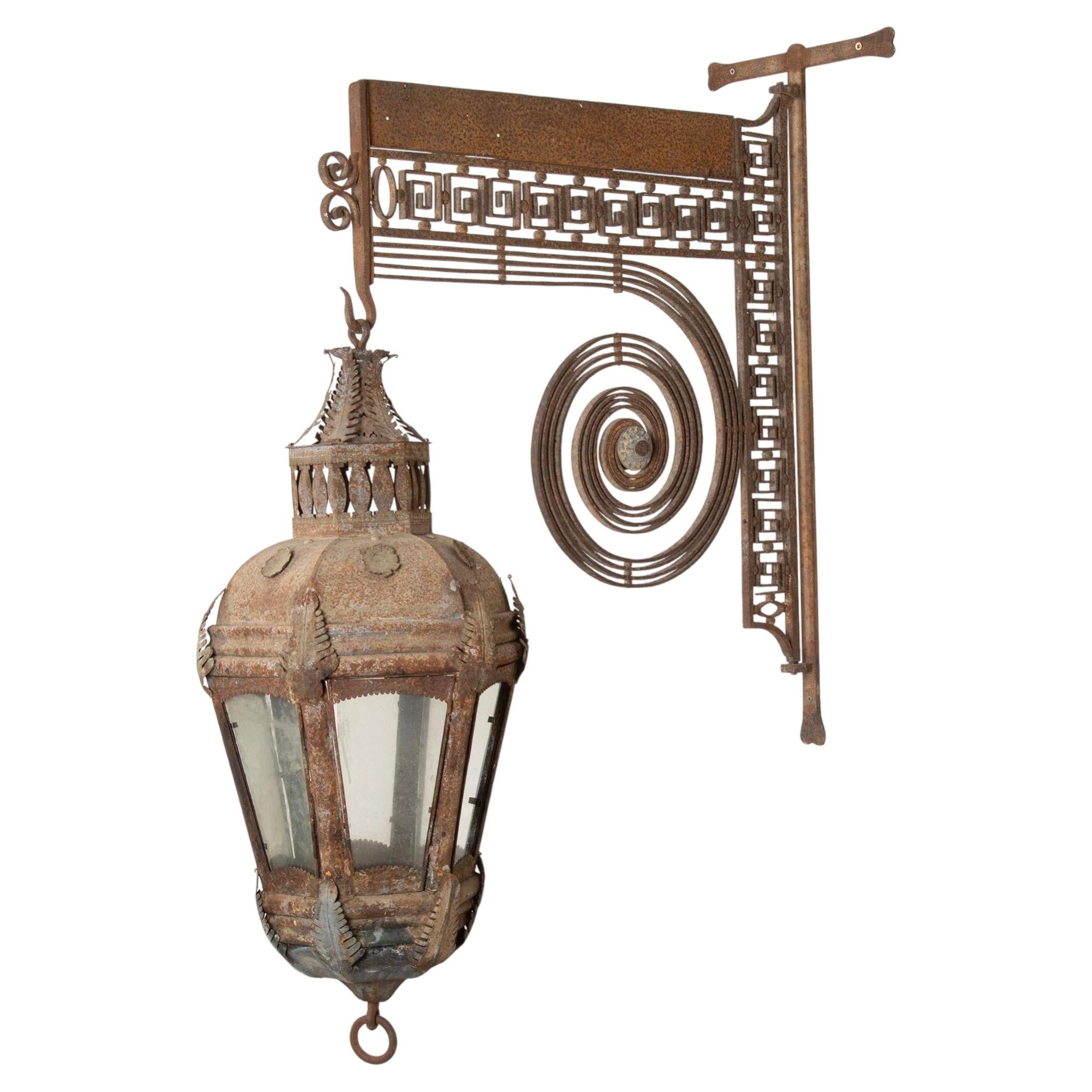 Late 19th Century French Tole Hanging Lantern with Wrought Iron Bracket