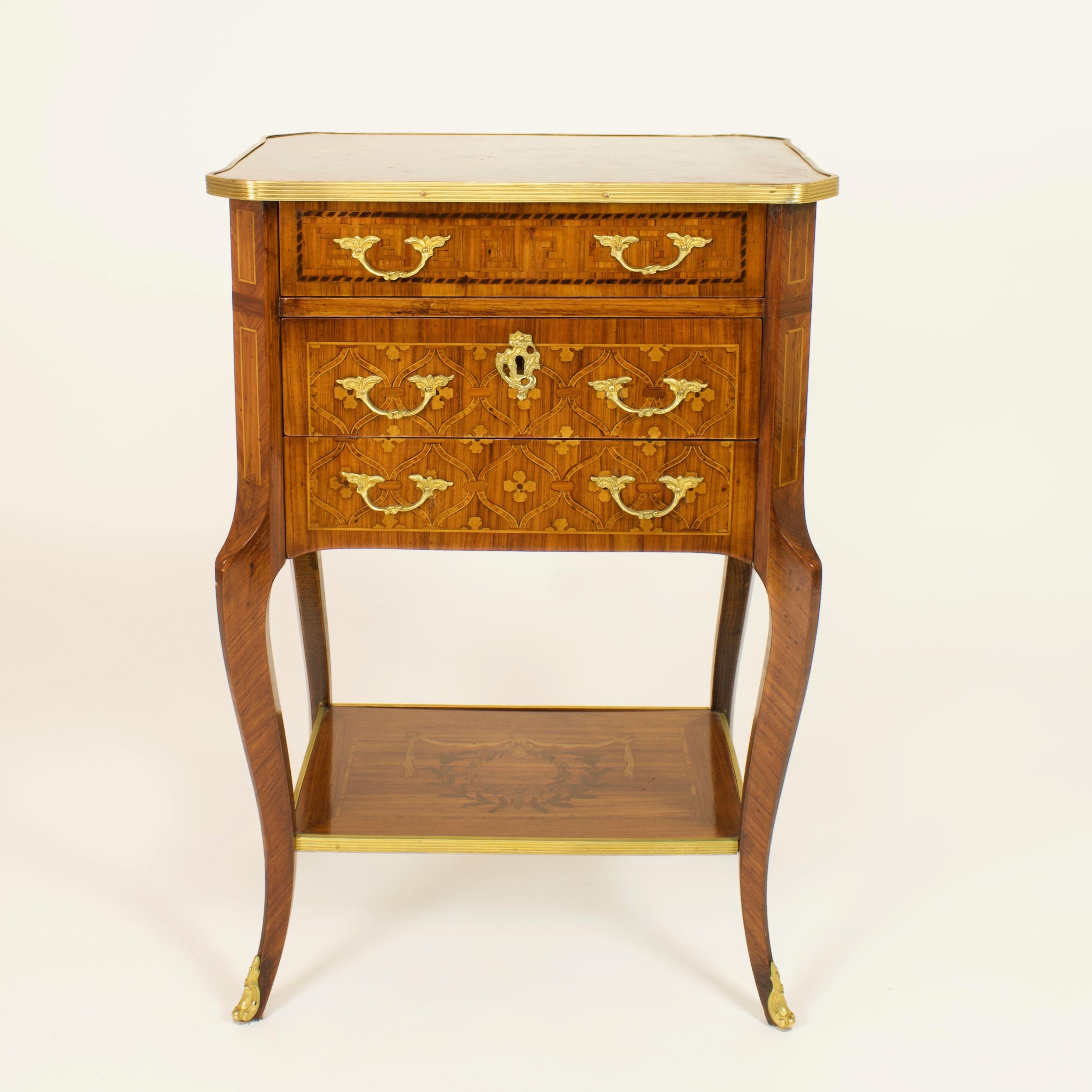 Late 19th Century French Louis XV/Transition Marquetry a la Reine side table

square table à la chiffonière with canted corners and three drawers standing on four cabriole legs, holding a stretcher with laurel wreath and drapery marquetry and gilt