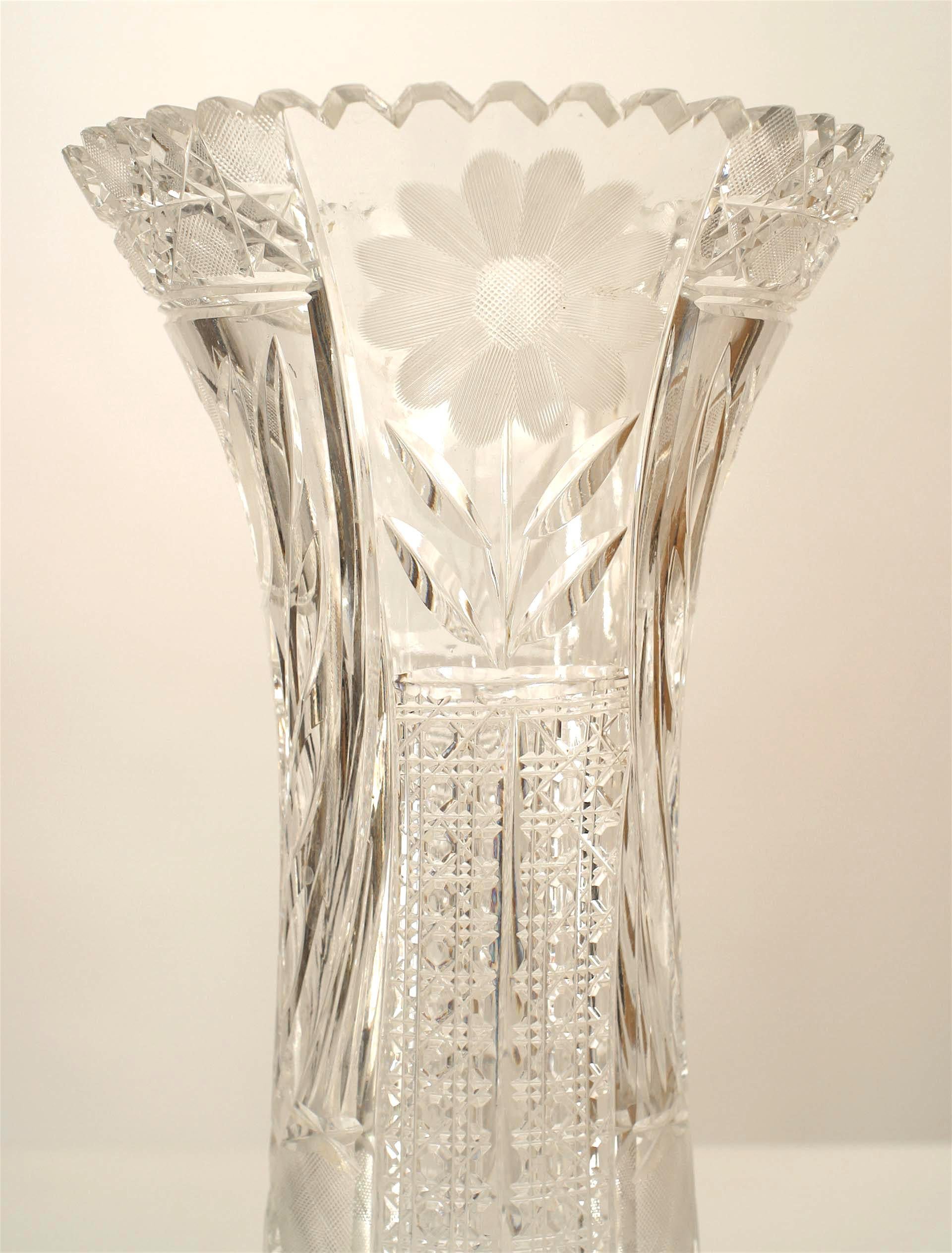 French Victorian tall shaped crystal vase with cut floral design and scalloped top.