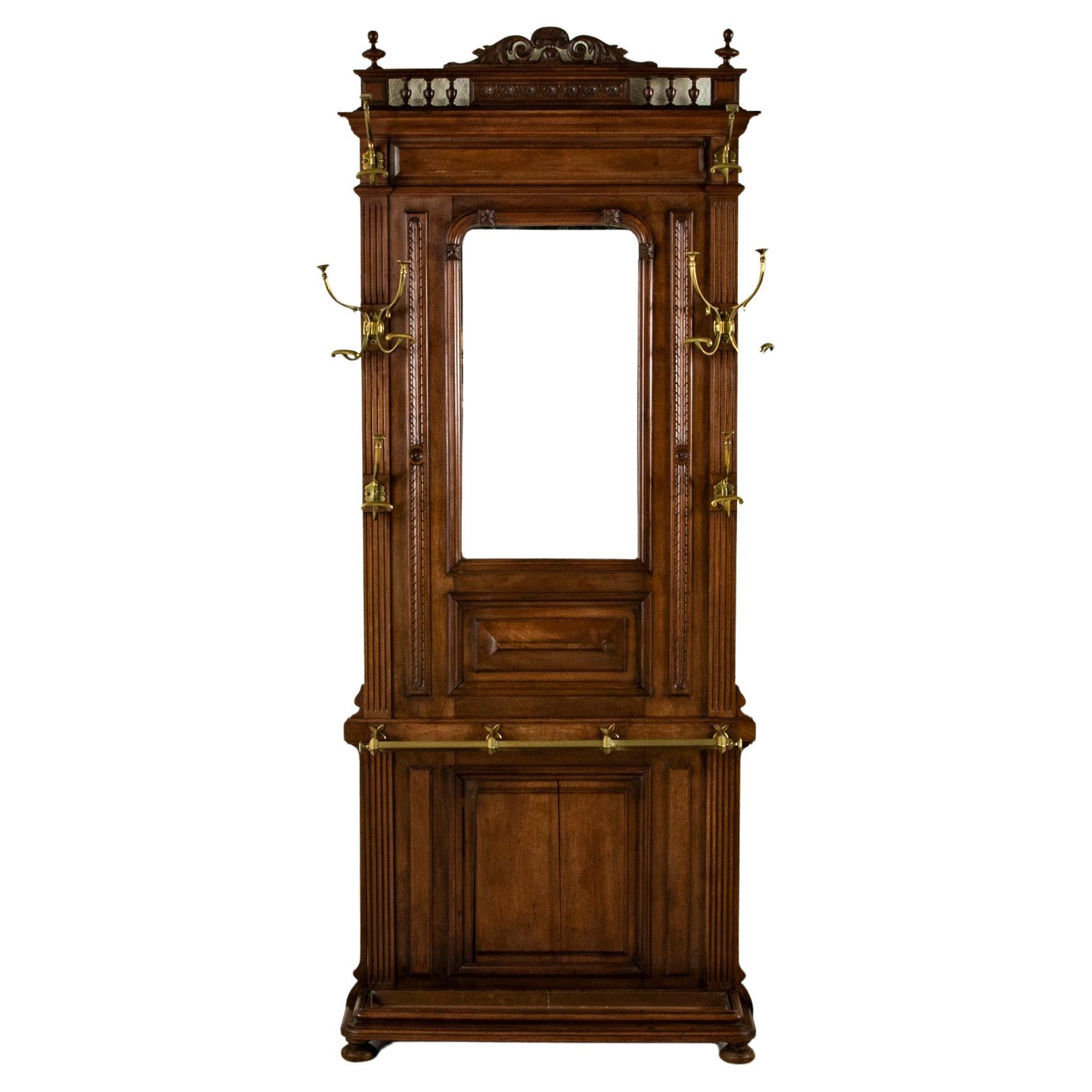 Late 19th Century French Walnut Hall Tree with Beveled Glass Mirror