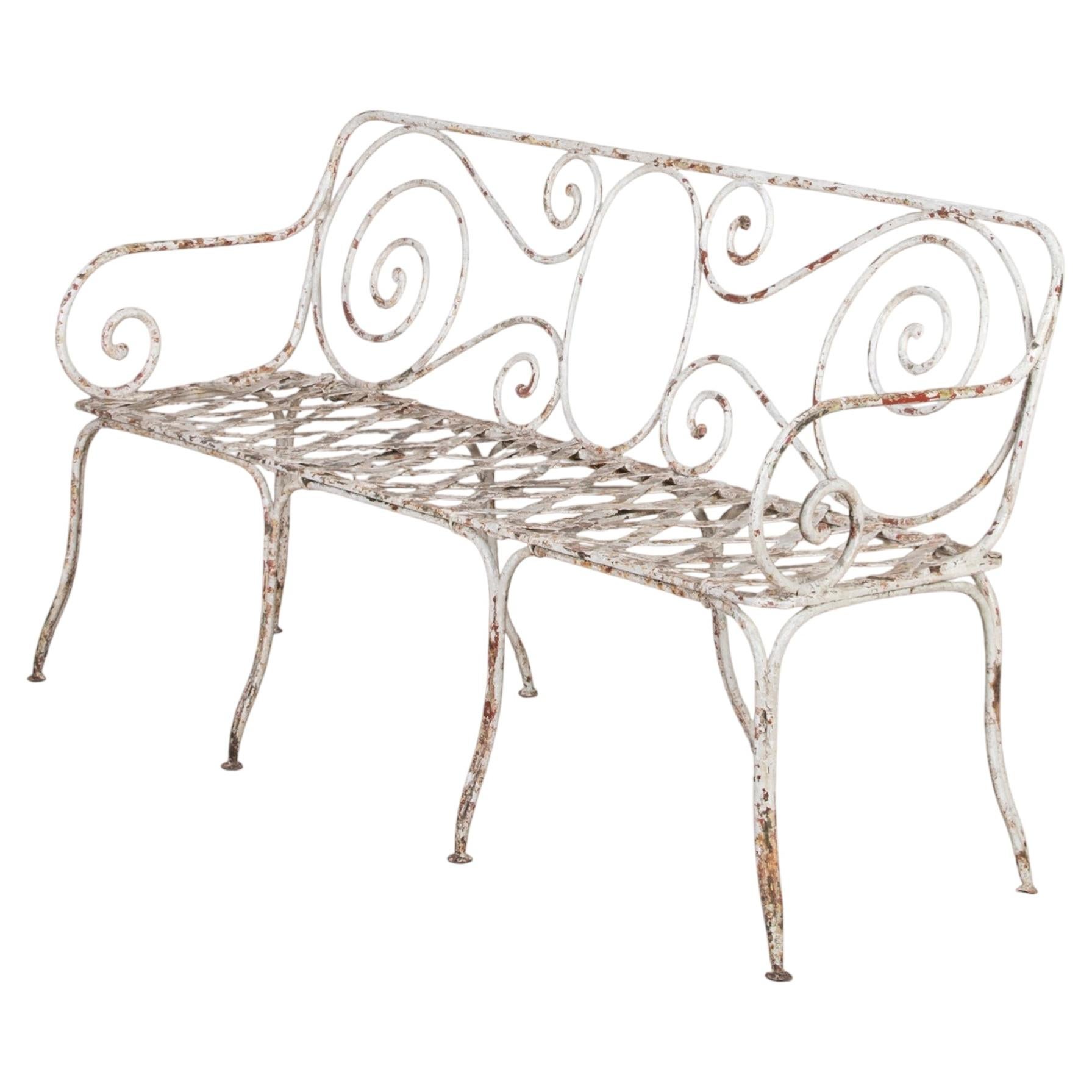 Asiento de jardín francés de hierro forjado de finales del siglo XIX