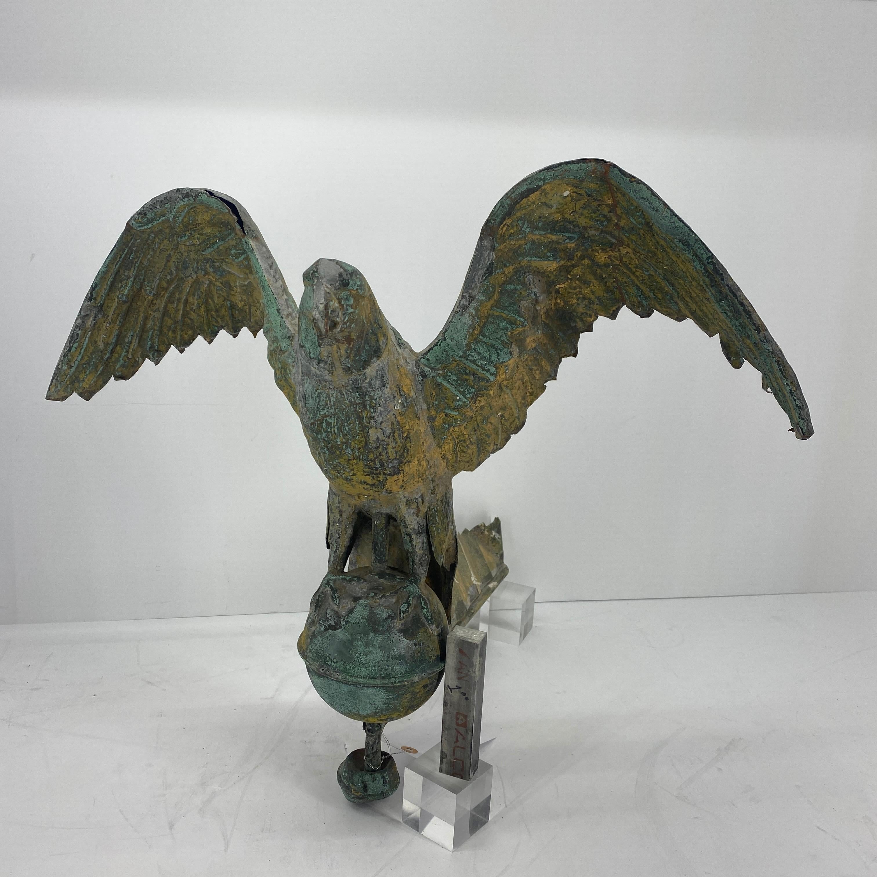 This late 19th Century eagle weather vane with signs of the original gilding is probably with from New England.
Custom made Lucite base is in production.