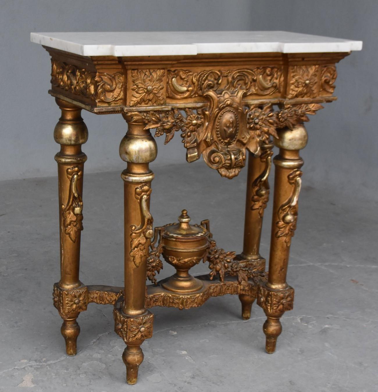 Late 19th century gilded and stucco console marble-top.