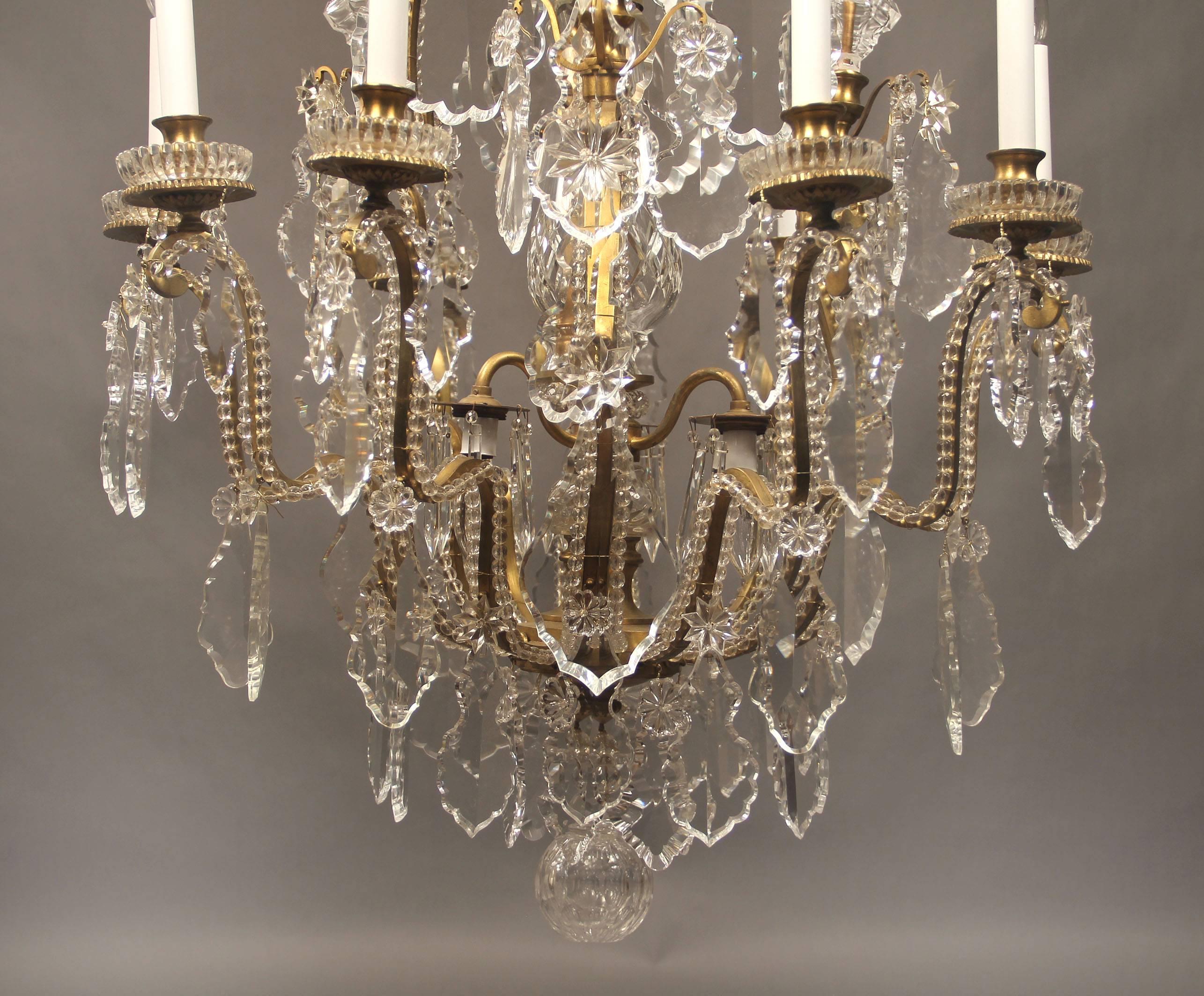 Belle Époque Late 19th Century Gilt Bronze and Baccarat Crystal Twelve-Light Chandelier For Sale