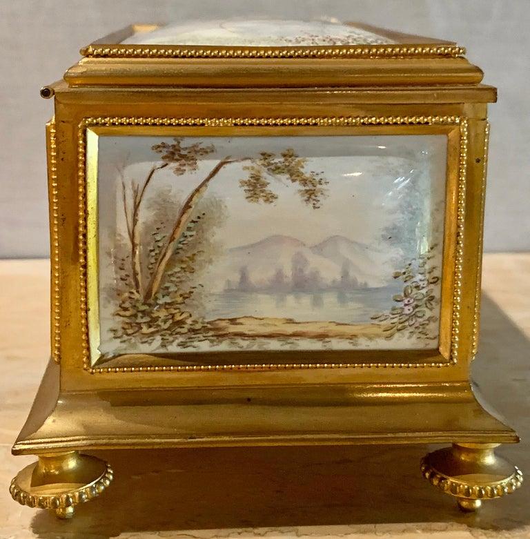 19th century French gilt bronze enameled jewelry casket box having peach velvet lined interior, unmarked. Measures: Height 3.75