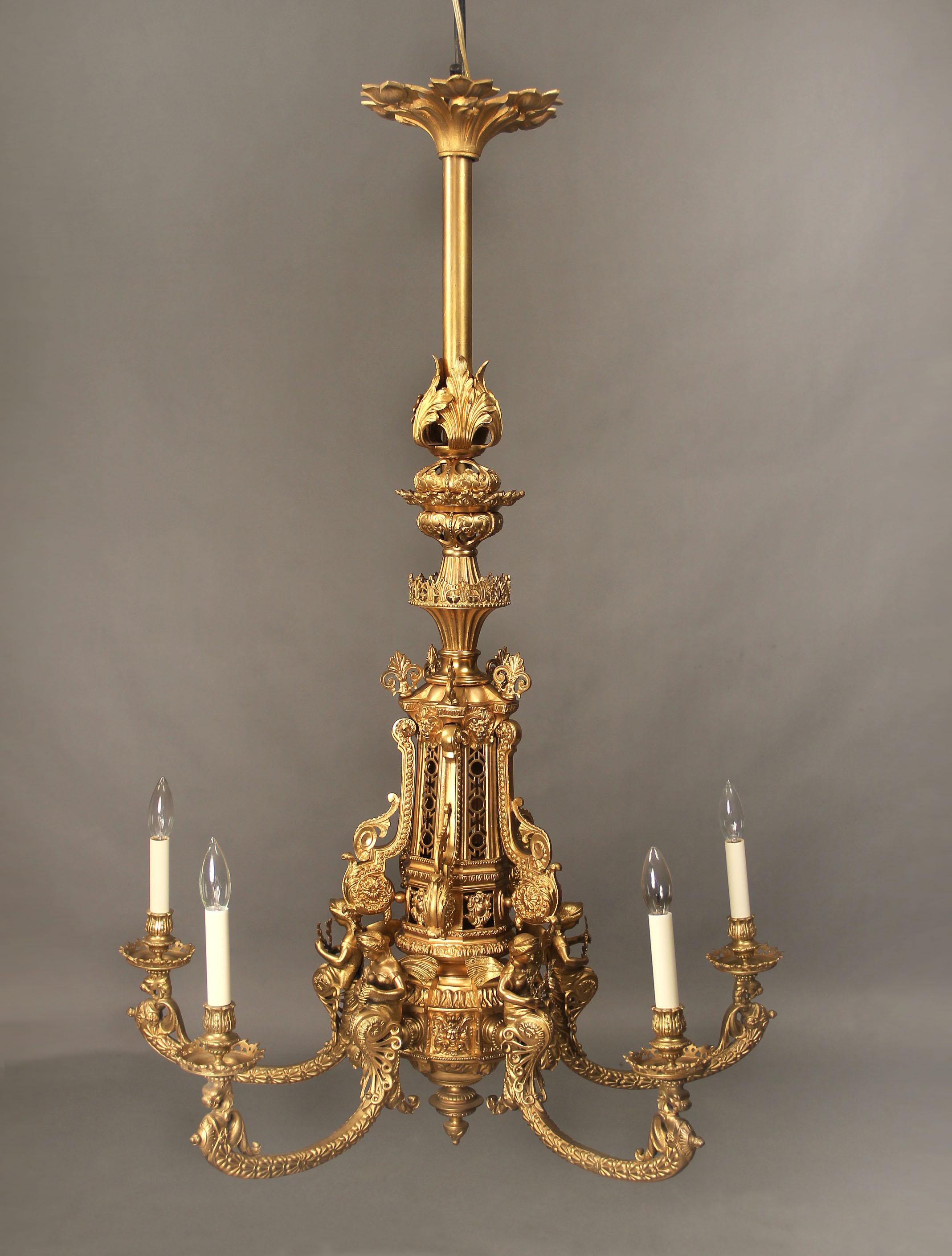 A late 19th century gilt bronze five-light chandelier

Heavy bronze casted, decorated with beautiful female nymphs. Each arm ending with dragons, the body with lion masks.

 