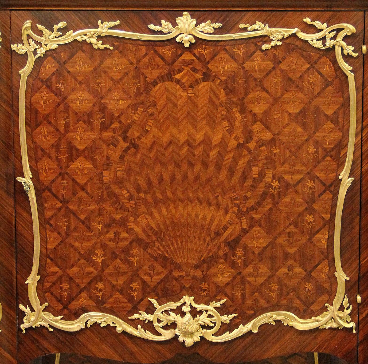 A lovely late 19th century Louis XV style gilt bronze mounted inlaid marquetry and parquetry cabinet by François Linke

François Linke – Index no. 832

The rectangular brèche violette marble top above a spreading frieze and conforming case, the