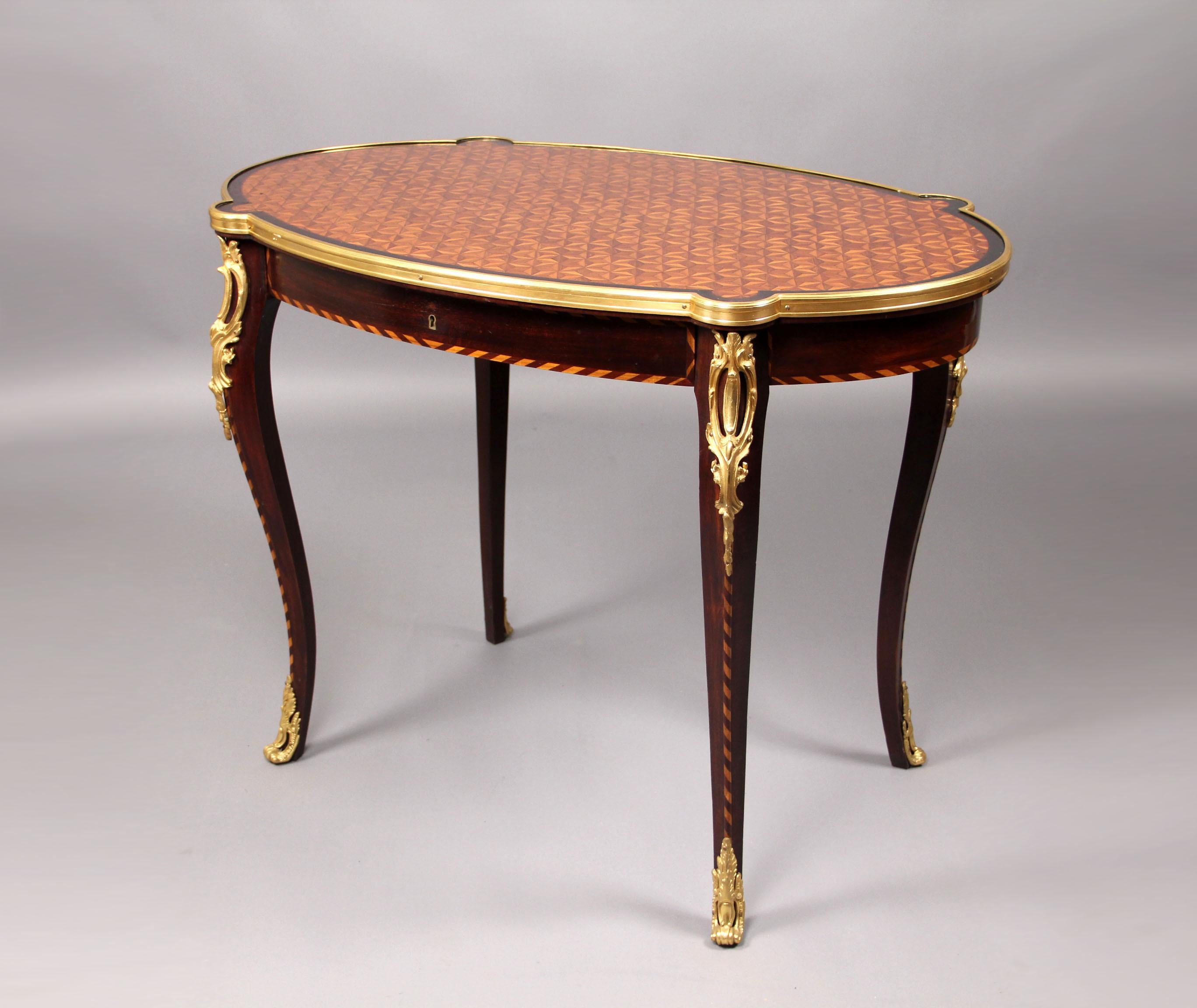 Beautiful Late 19th Century Louis XV Style Gilt Bronze Mounted Parquetry Top Center Table

Oval cubed parquetry top above a long single drawer, raised by bronze mounted cabriole legs.

Details:
Height – 29 inches / 74cm
Width – 39 inches /